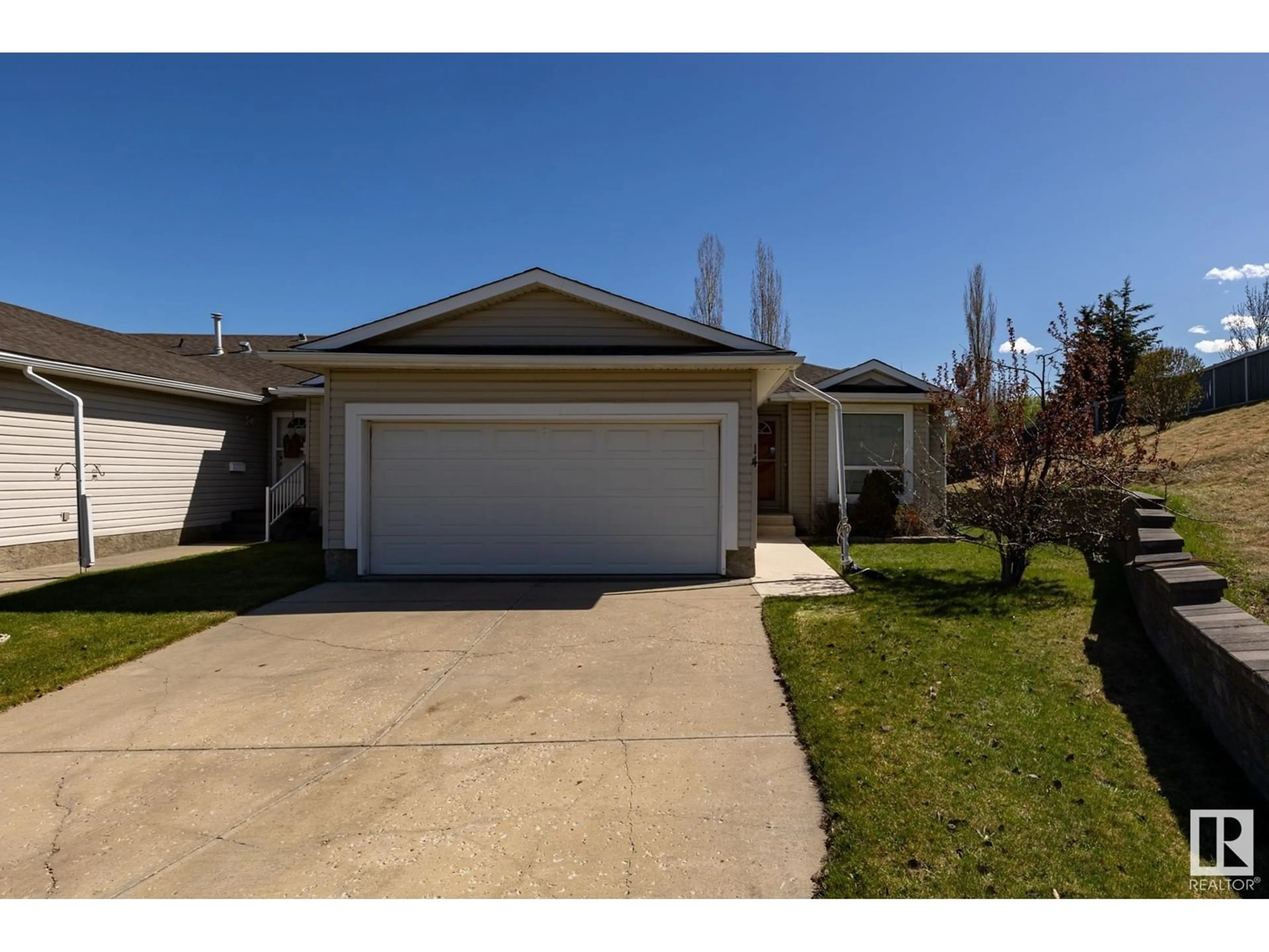 Home with vinyl exterior material, street for 14 HILLCREST CO, Spruce Grove Alberta T7X4A8