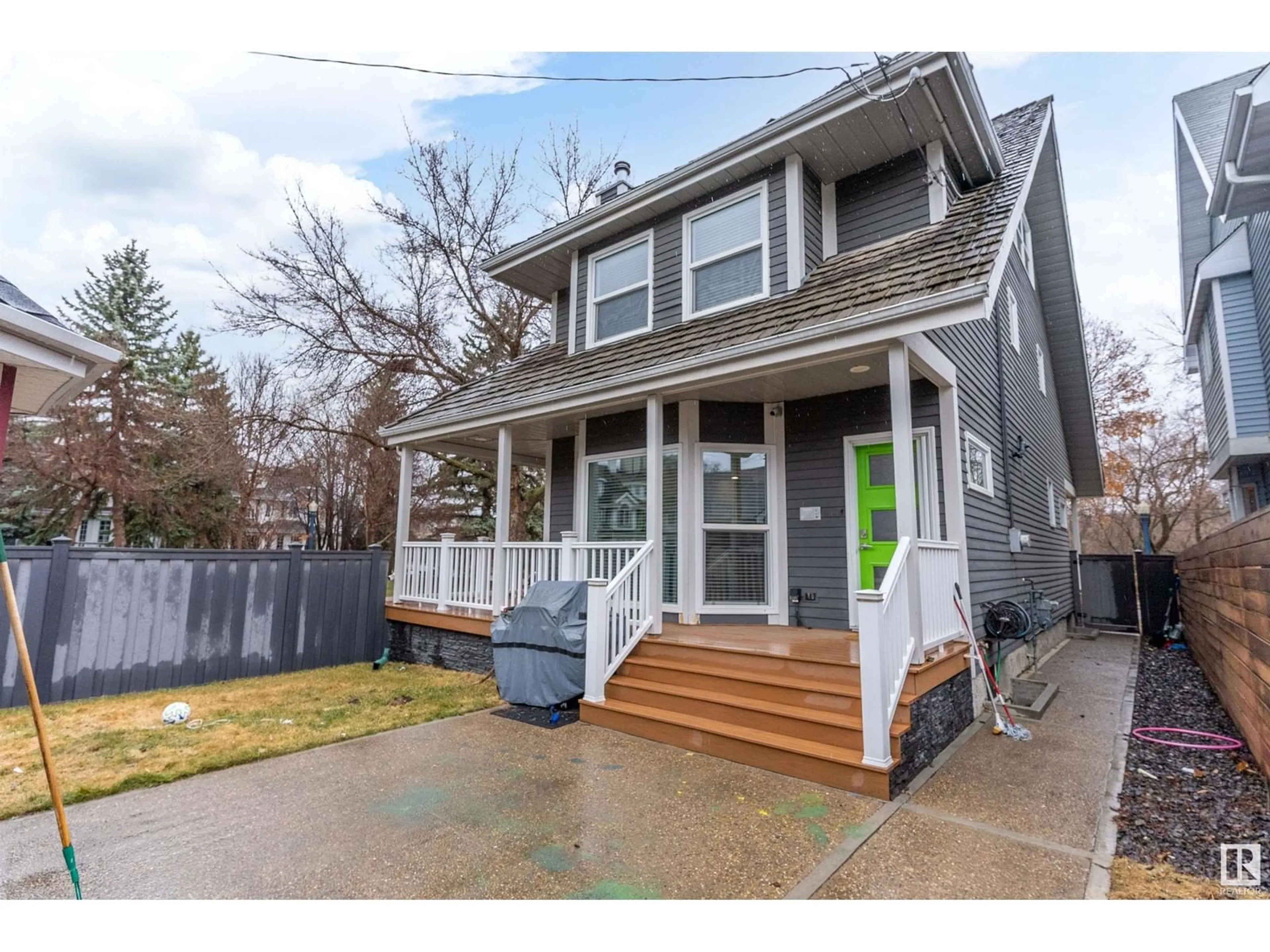 Home with vinyl exterior material, street for 9654 100 ST, Edmonton Alberta T5K0T6