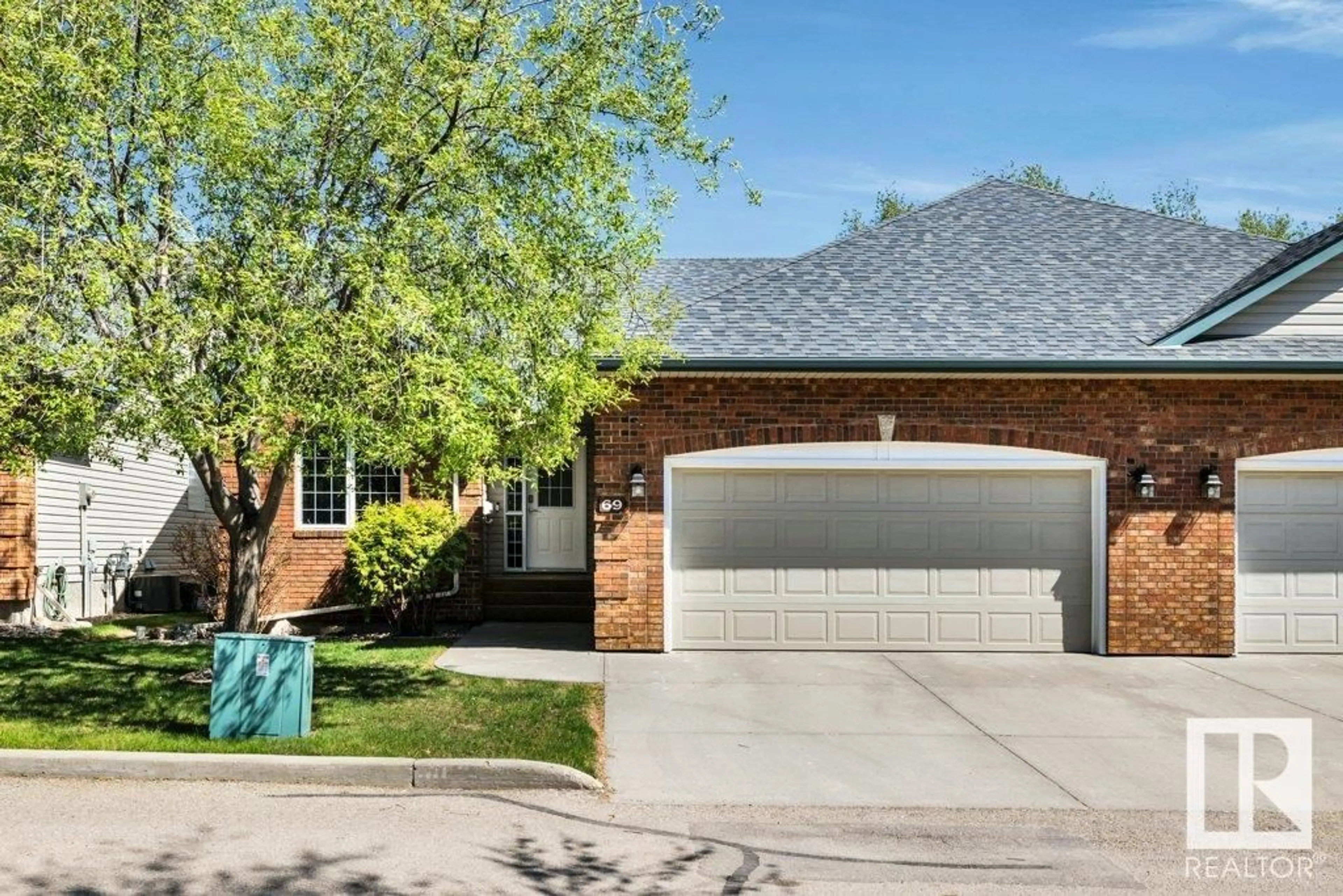 Home with brick exterior material, street for 57B - 69 ERIN RIDGE DR, St. Albert Alberta T8N6G1