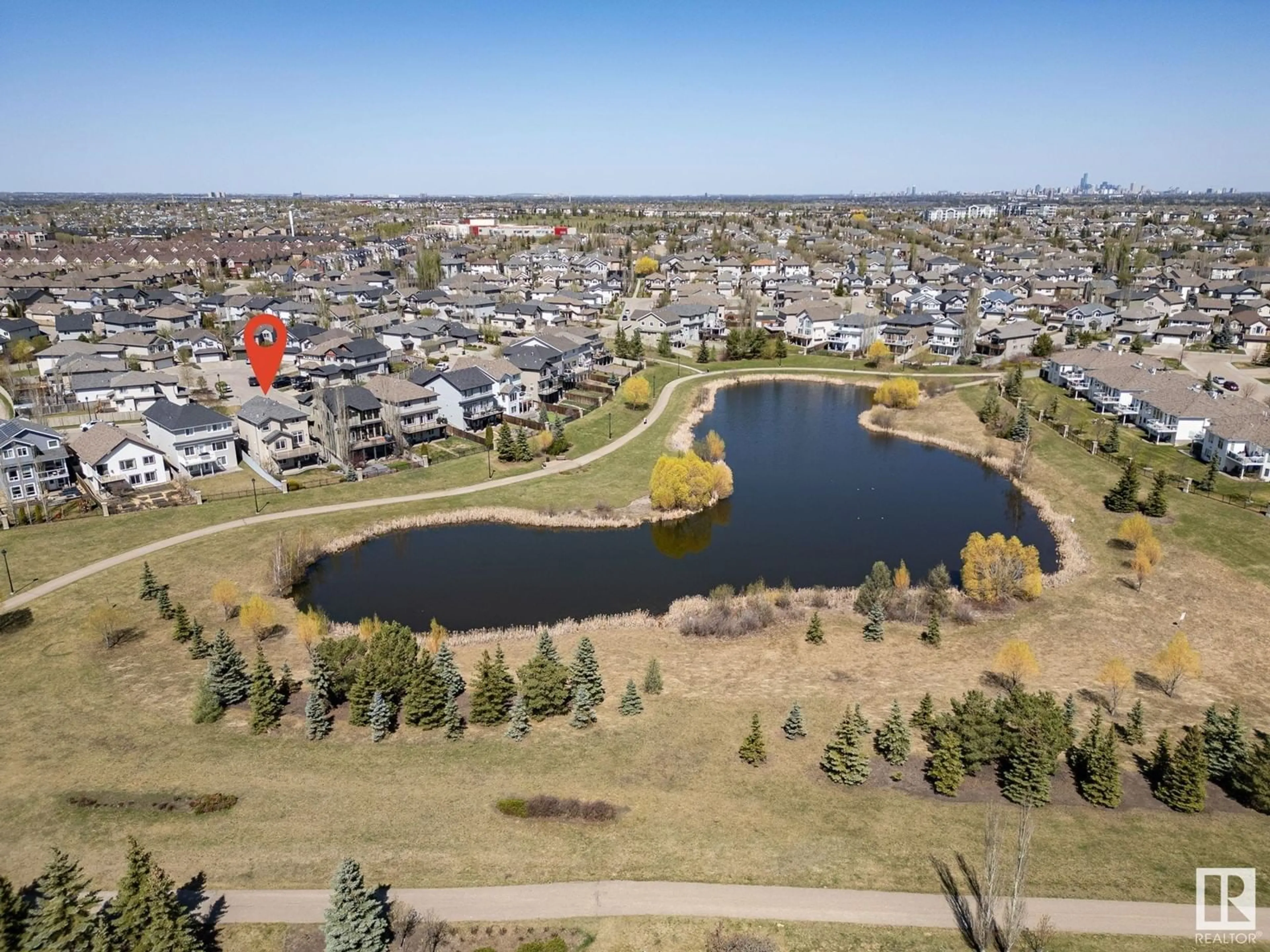 A pic from outside/outdoor area/front of a property/back of a property/a pic from drone, water/lake/river/ocean view for 7517 SPEAKER WY, Edmonton Alberta T6R0R5