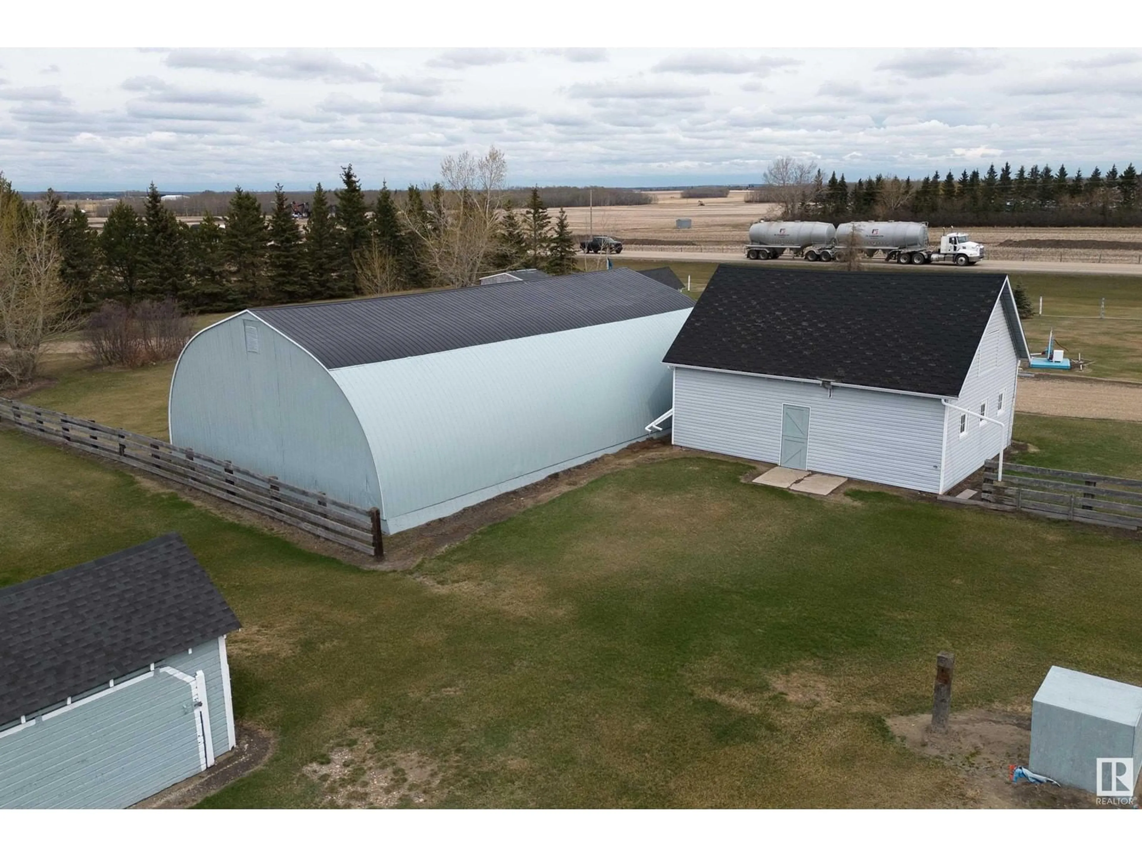 A pic from outside/outdoor area/front of a property/back of a property/a pic from drone, building for 26304 TWP RD 502, Rural Leduc County Alberta T9G0G8