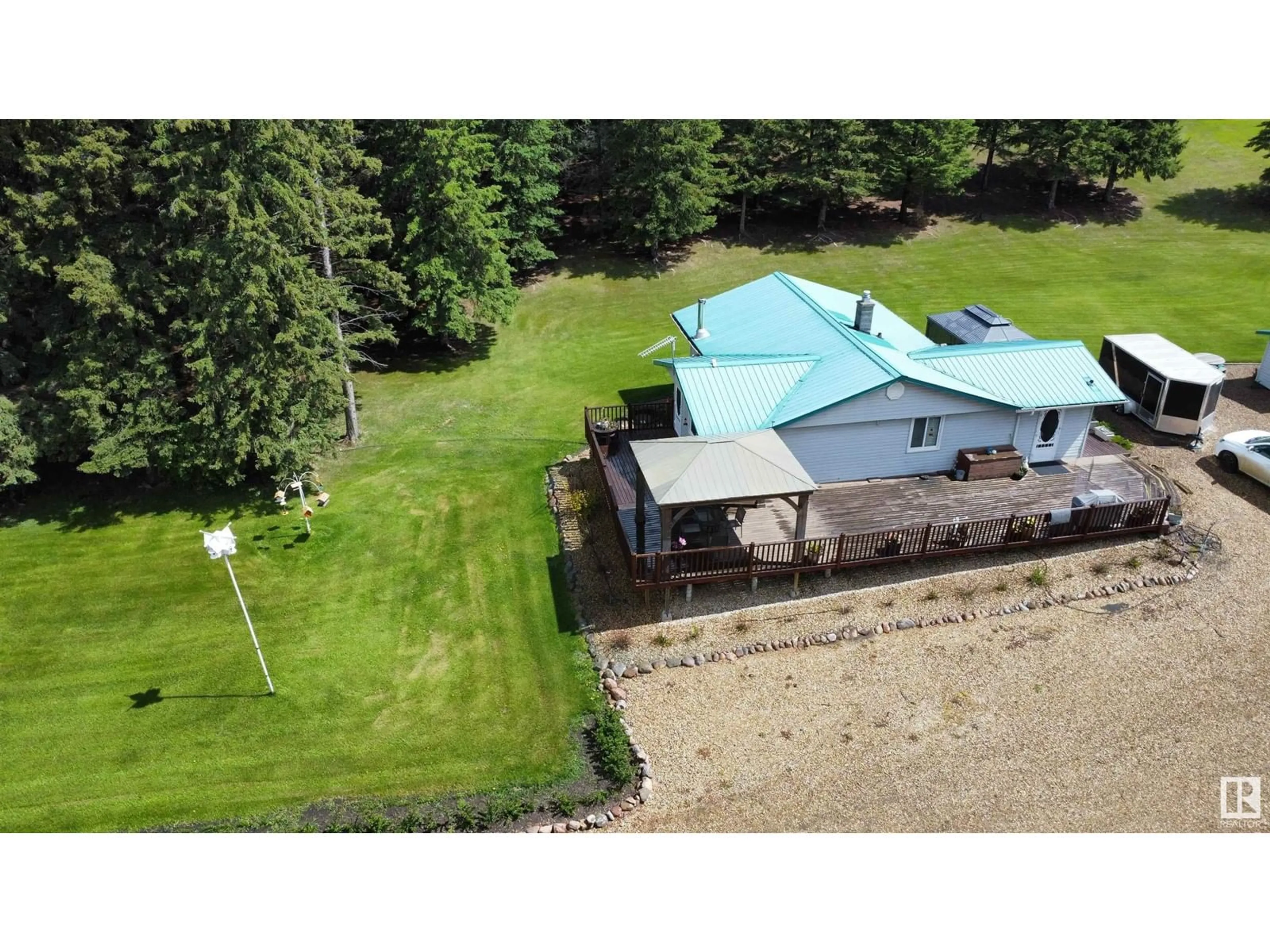 A pic from outside/outdoor area/front of a property/back of a property/a pic from drone, unknown for 1101 TWP RD 590, Rural Westlock County Alberta T0G1W0