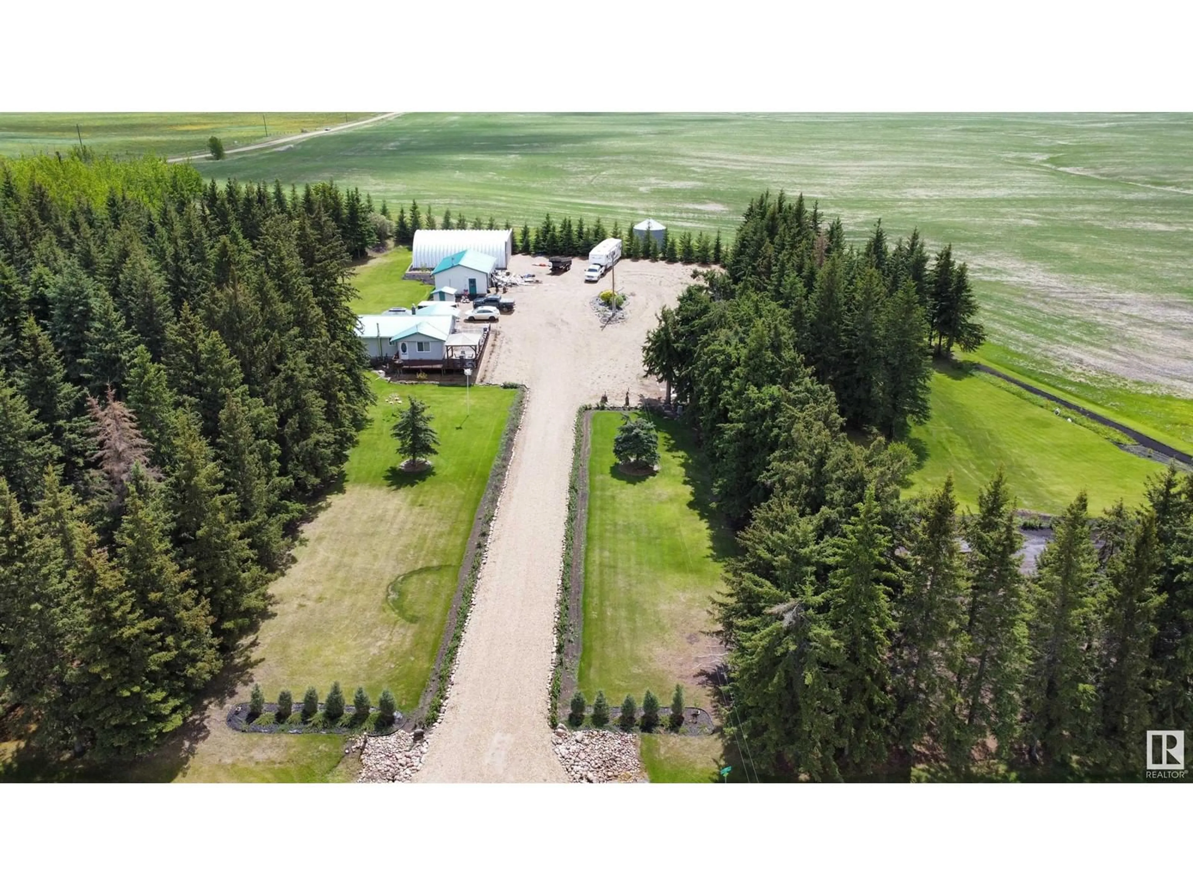 A pic from outside/outdoor area/front of a property/back of a property/a pic from drone, unknown for 1101 TWP RD 590, Rural Westlock County Alberta T0G1W0