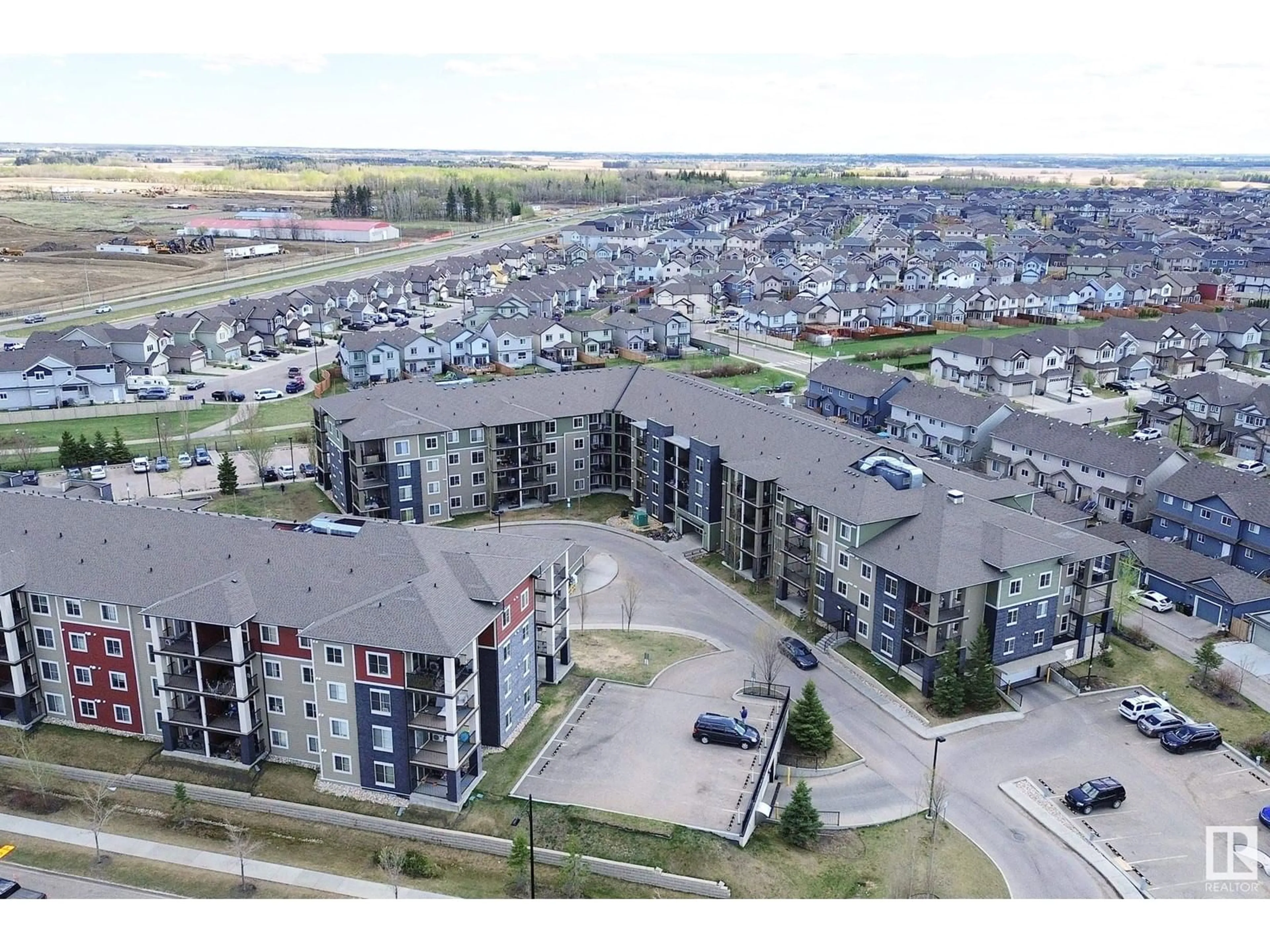 A pic from outside/outdoor area/front of a property/back of a property/a pic from drone, unknown for 216 - 111 WATT CM, Edmonton Alberta T6X2C6