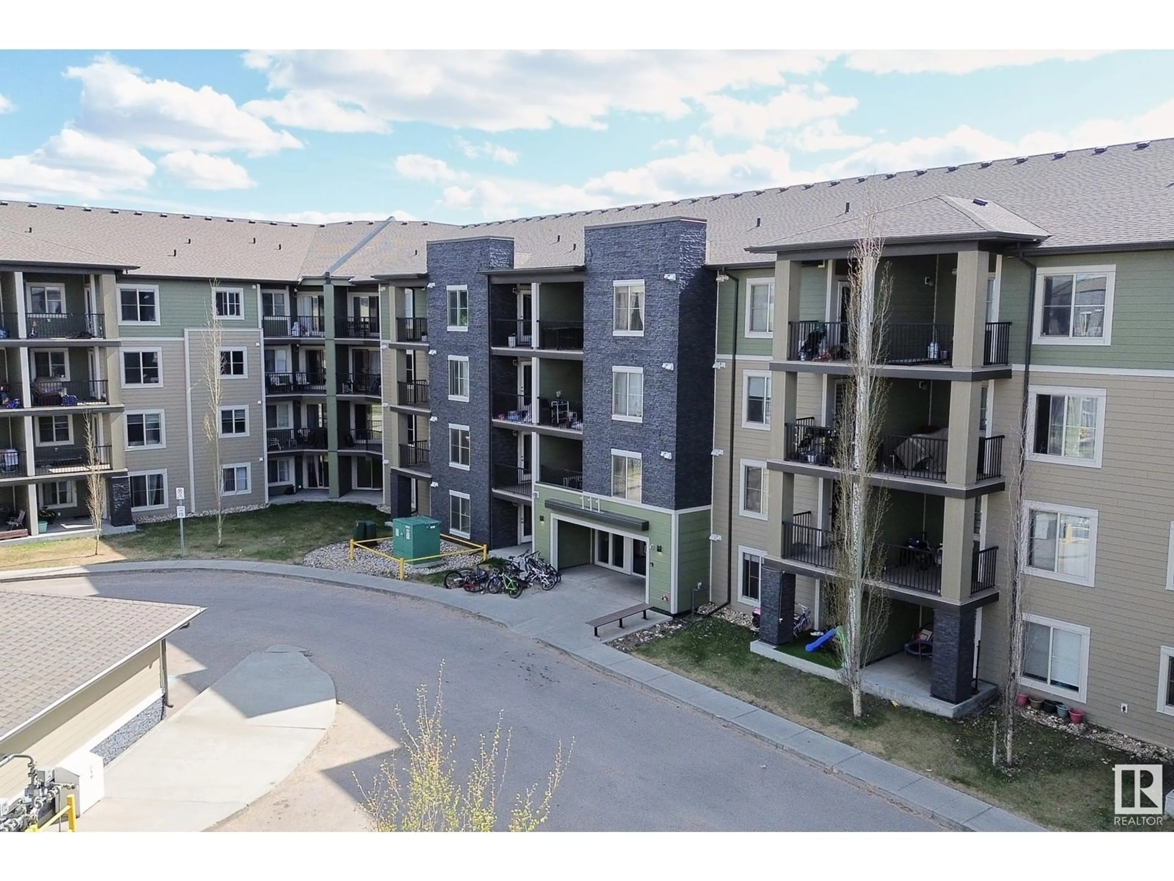 A pic from outside/outdoor area/front of a property/back of a property/a pic from drone, building for 216 - 111 WATT CM, Edmonton Alberta T6X2C6