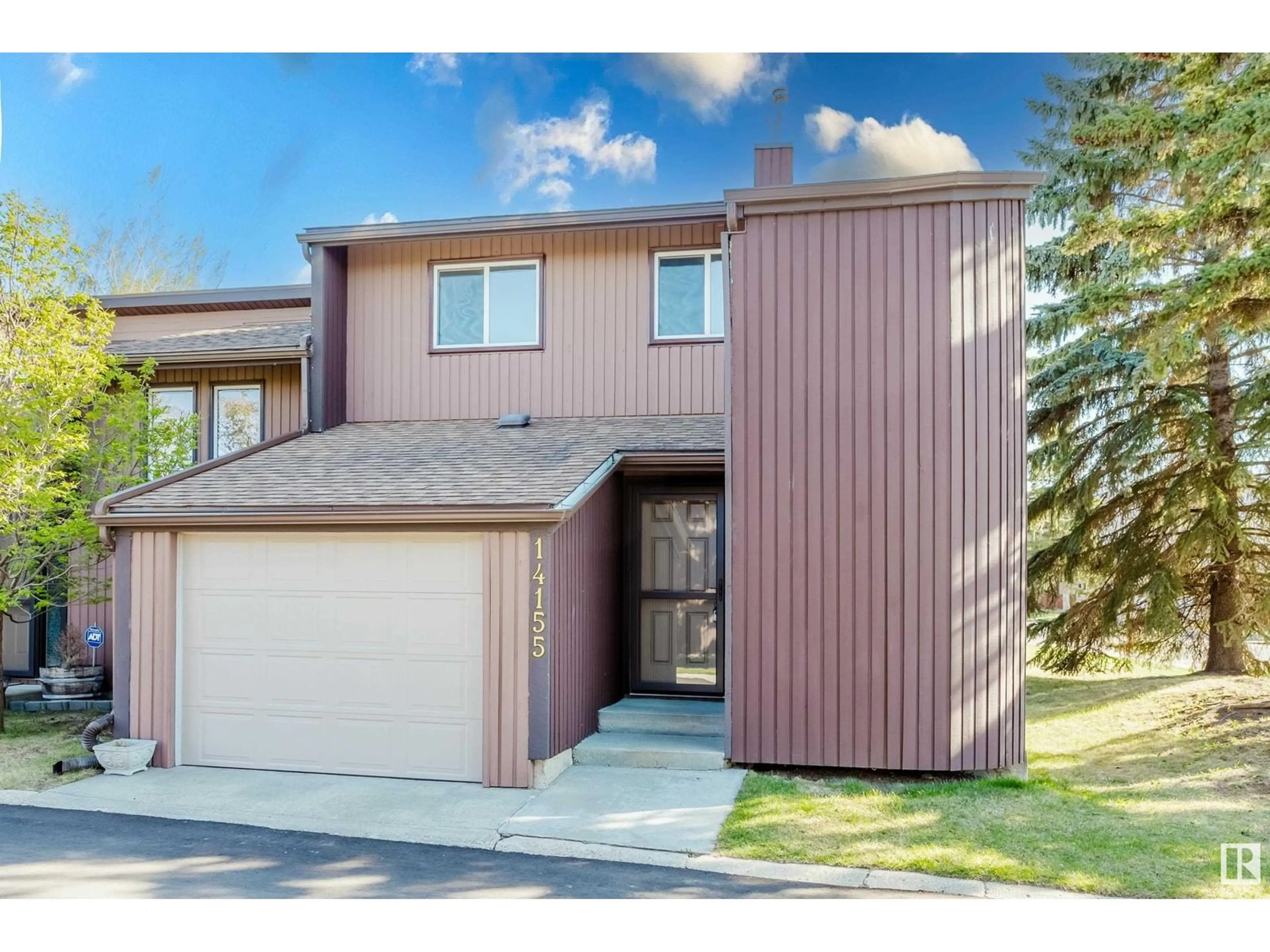 Home with vinyl exterior material, street for 14155 26 ST, Edmonton Alberta T5Y1S2