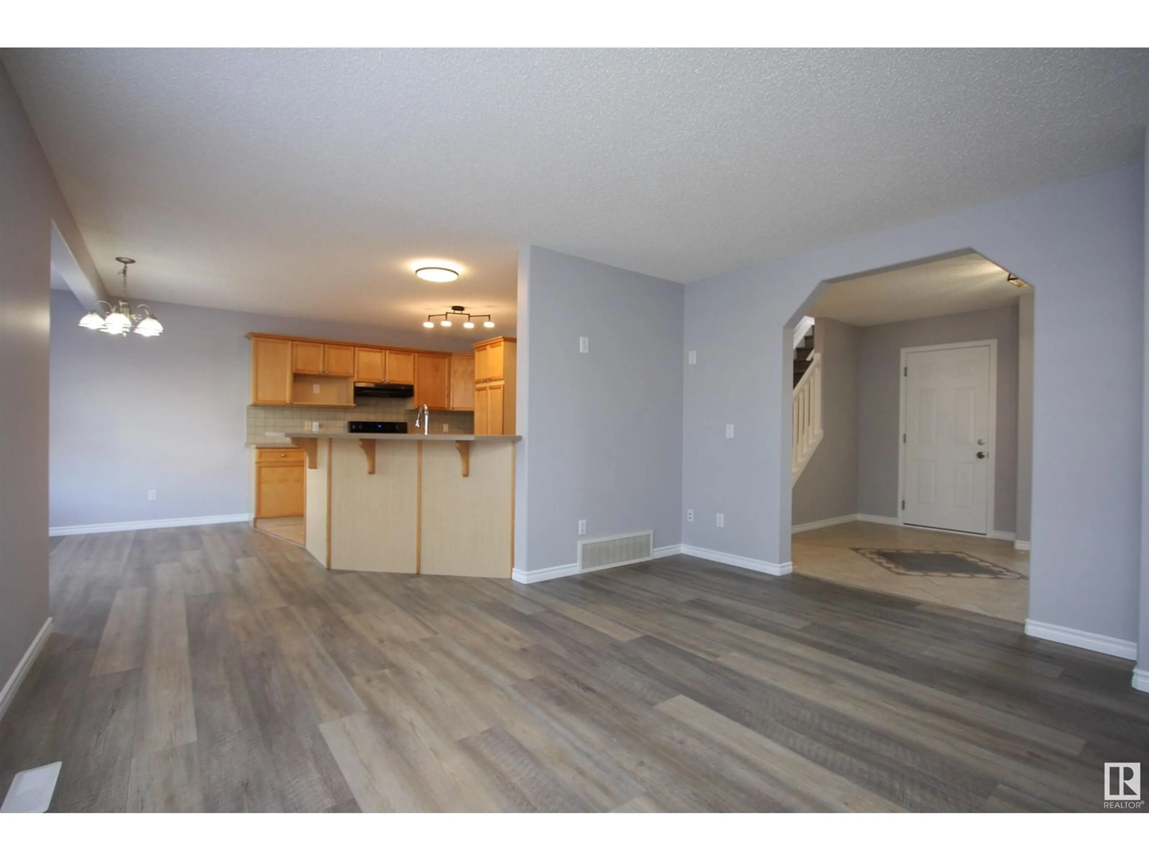 Open concept kitchen, wood/laminate floor for 1145 WESTERRA LI, Stony Plain Alberta T7Z2Z4