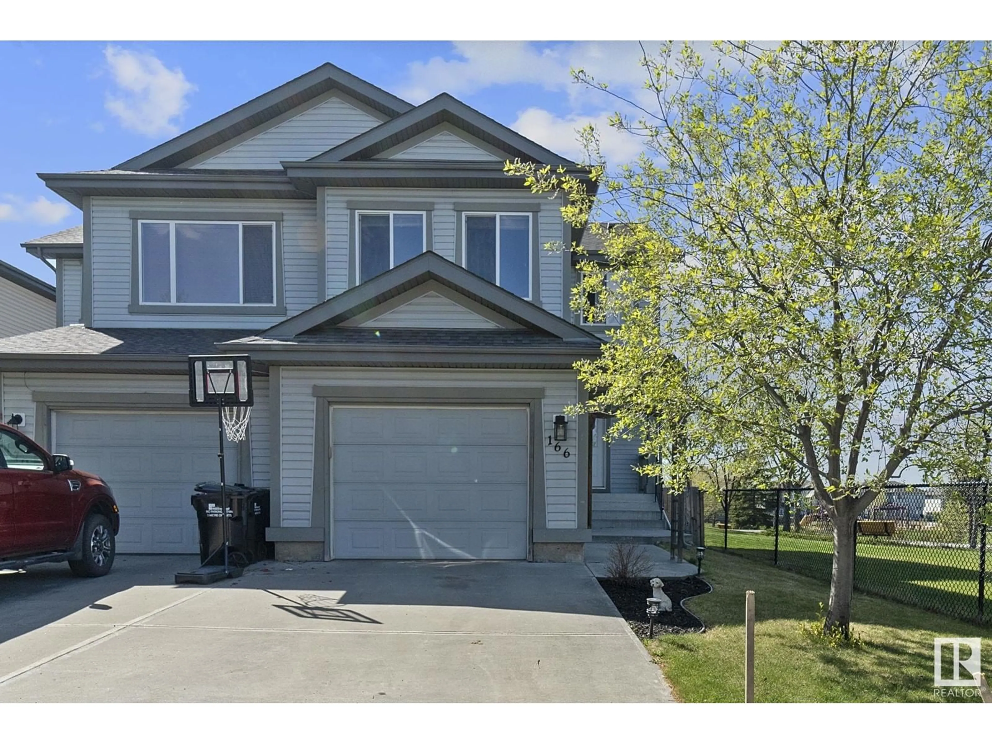 Home with vinyl exterior material, street for 166 SUMMERTON CR, Sherwood Park Alberta T8H2V6