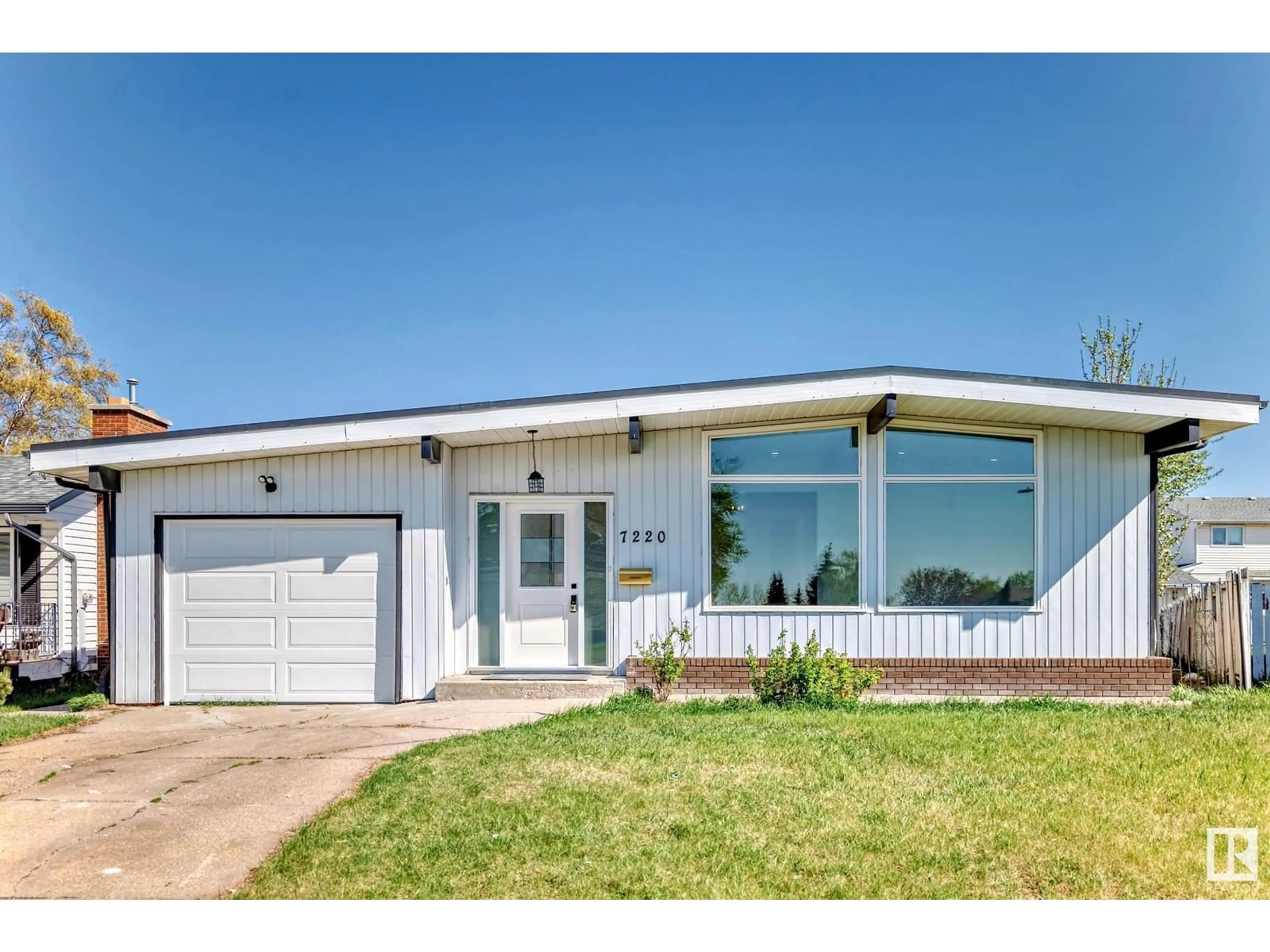 Home with vinyl exterior material, street for 7220 152A AVE, Edmonton Alberta T5C2Z4