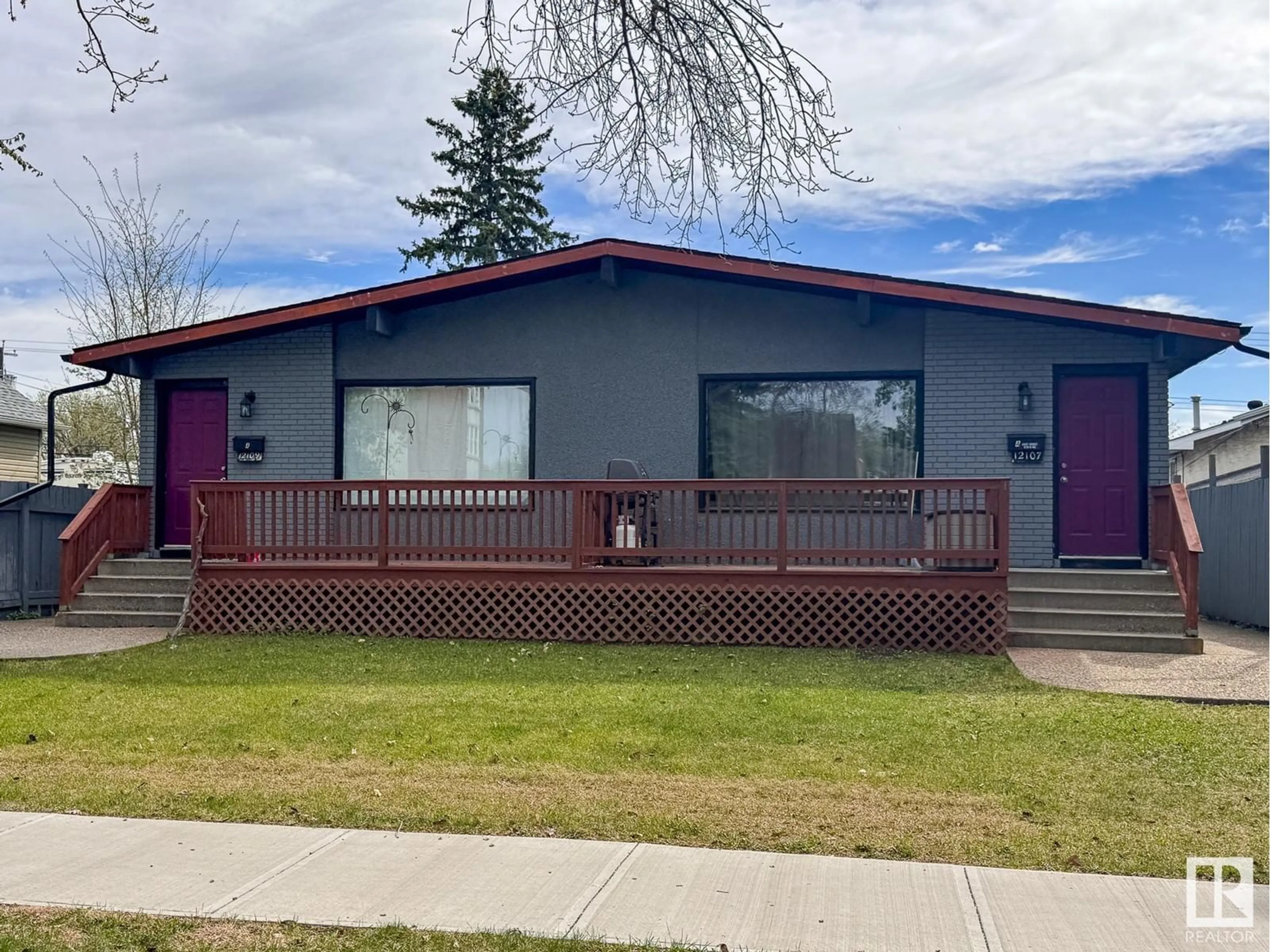 Home with vinyl exterior material, street for NW - 12107-12109 89 ST, Edmonton Alberta T5B3W3