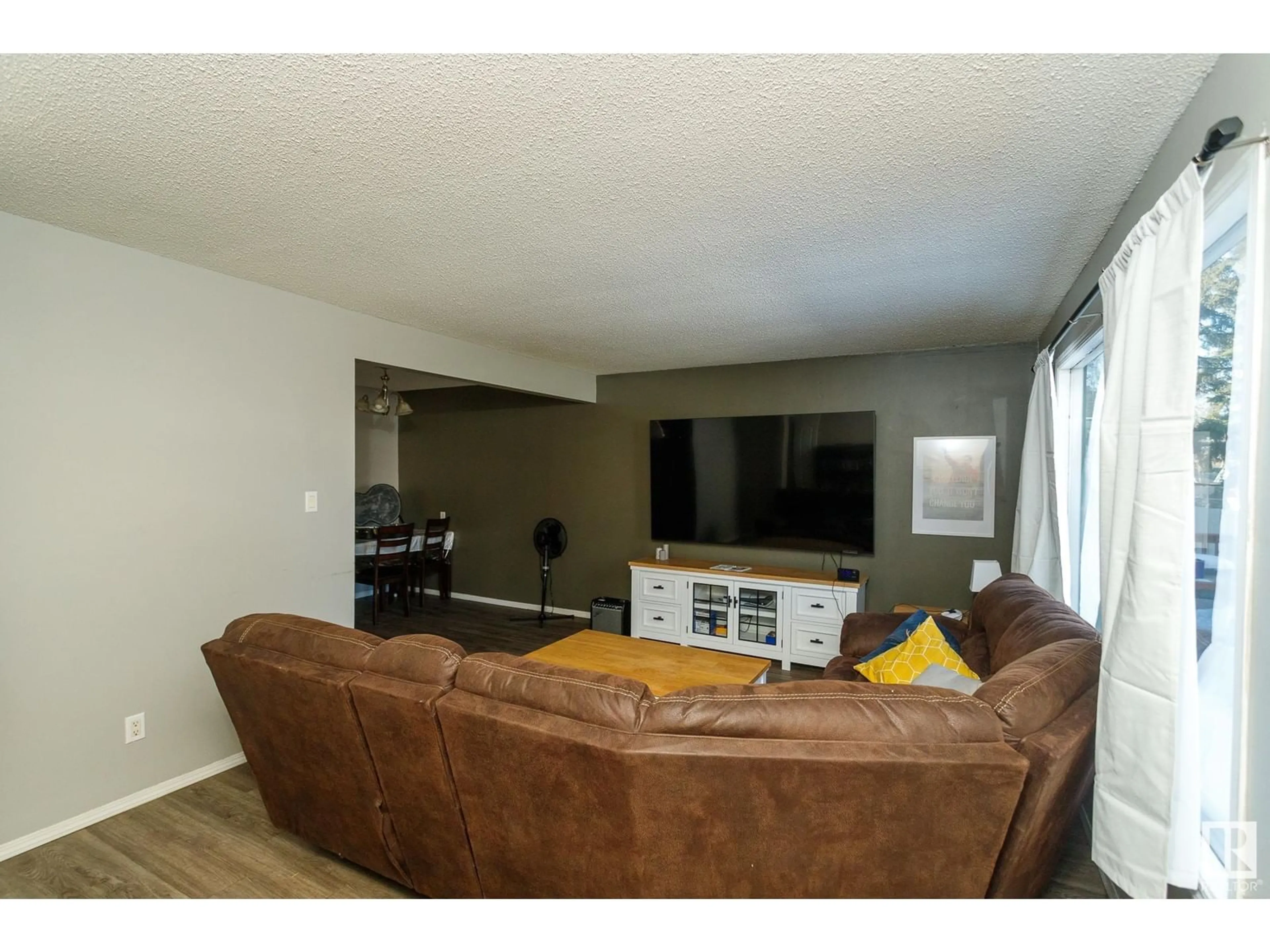 Living room with furniture, unknown for NW - 12107-12109 89 ST, Edmonton Alberta T5B3W3