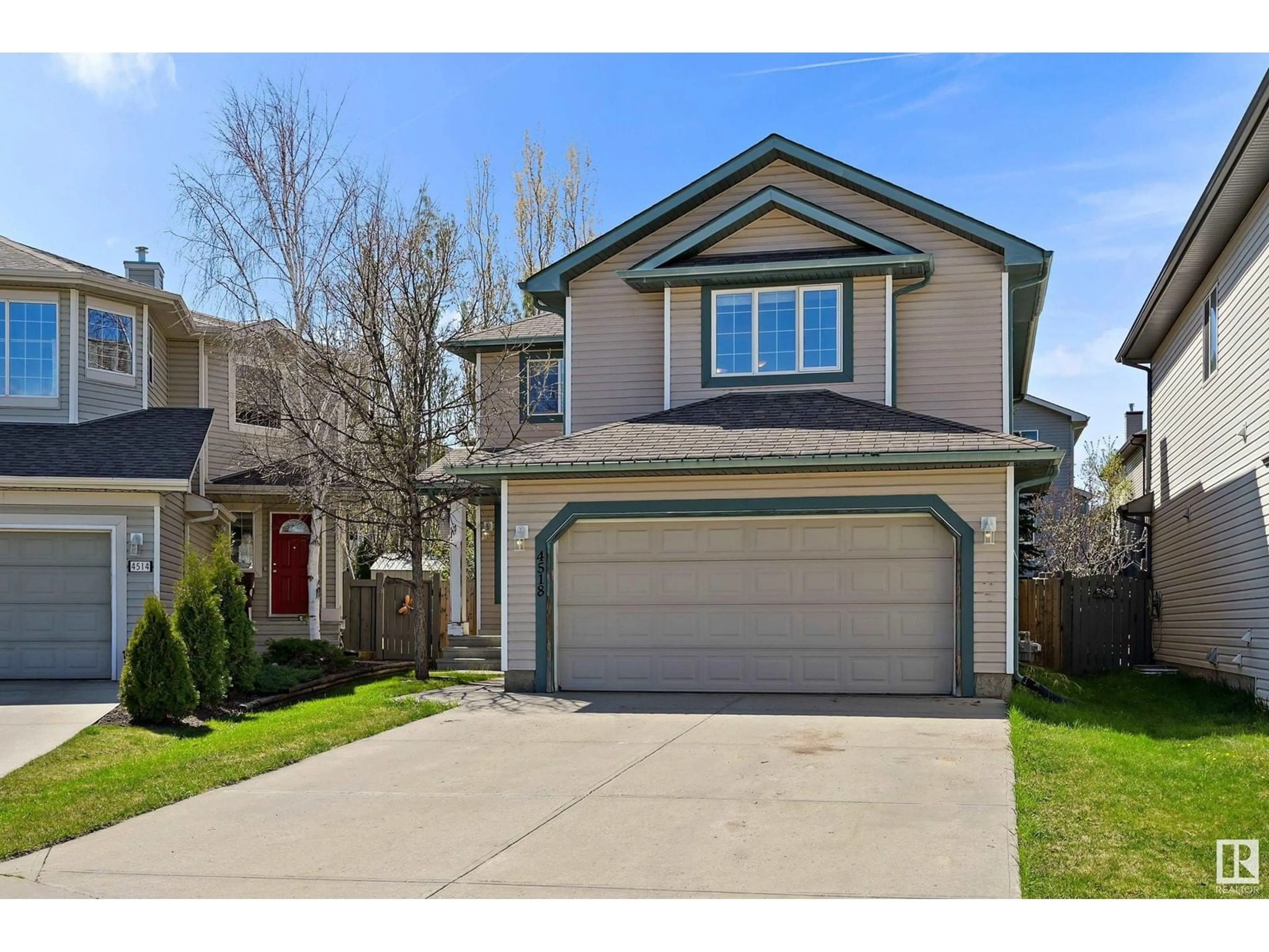 Home with vinyl exterior material, street for NW - 4518 211A ST, Edmonton Alberta T6M0G4