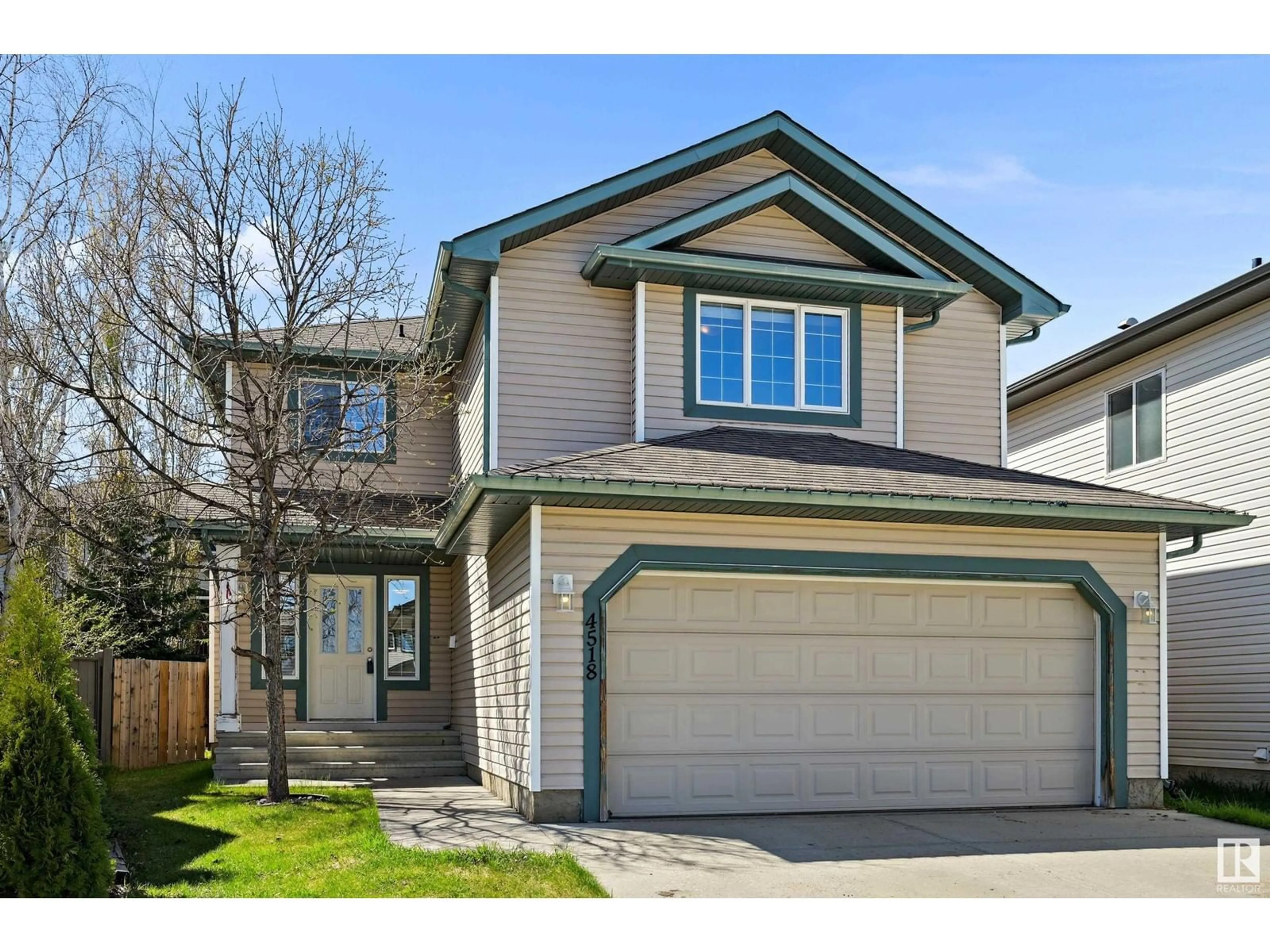 Home with vinyl exterior material, street for NW - 4518 211A ST, Edmonton Alberta T6M0G4