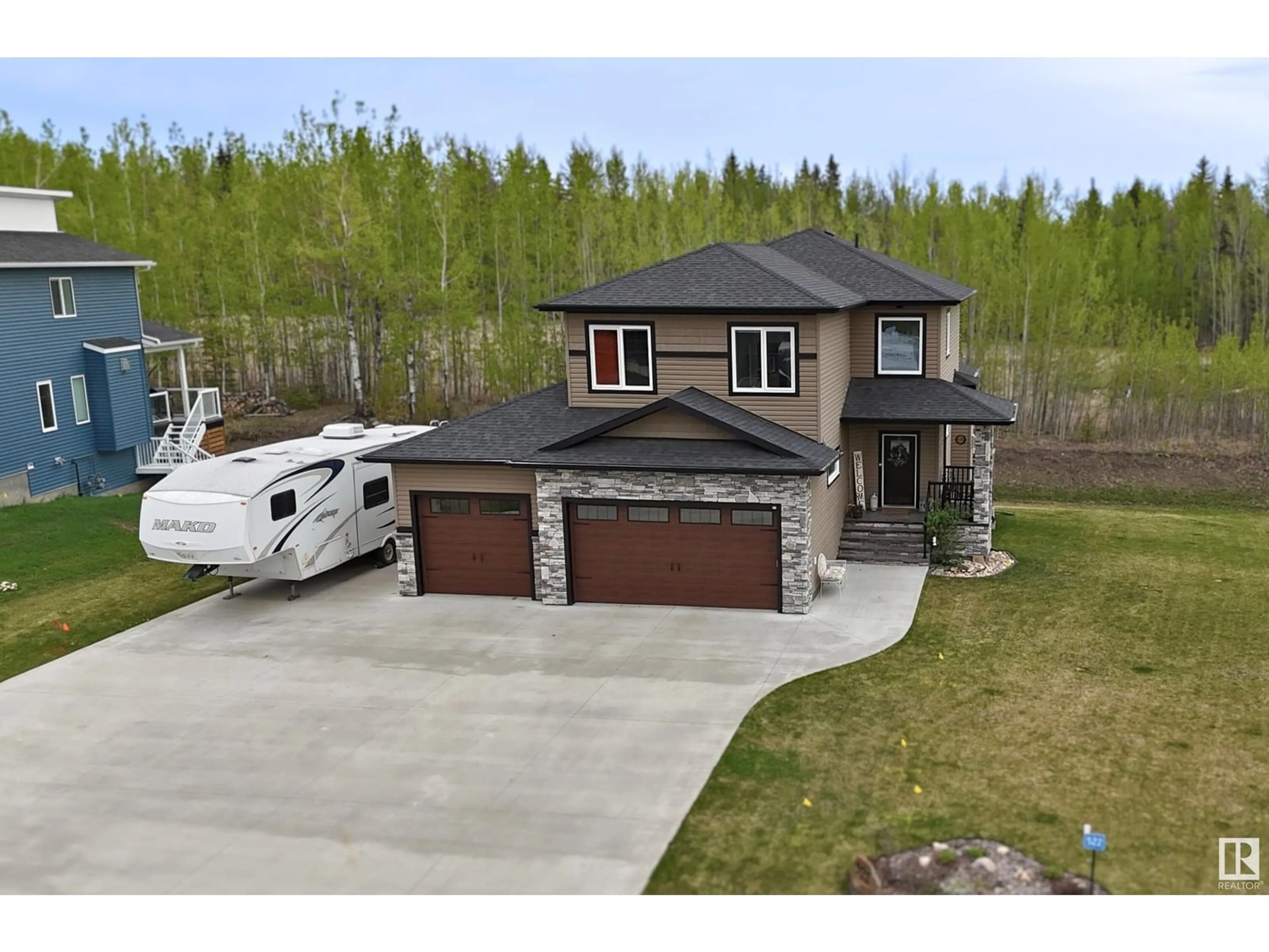 A pic from outside/outdoor area/front of a property/back of a property/a pic from drone, street for 522 49119 RR73, Rural Brazeau County Alberta T7A2A2