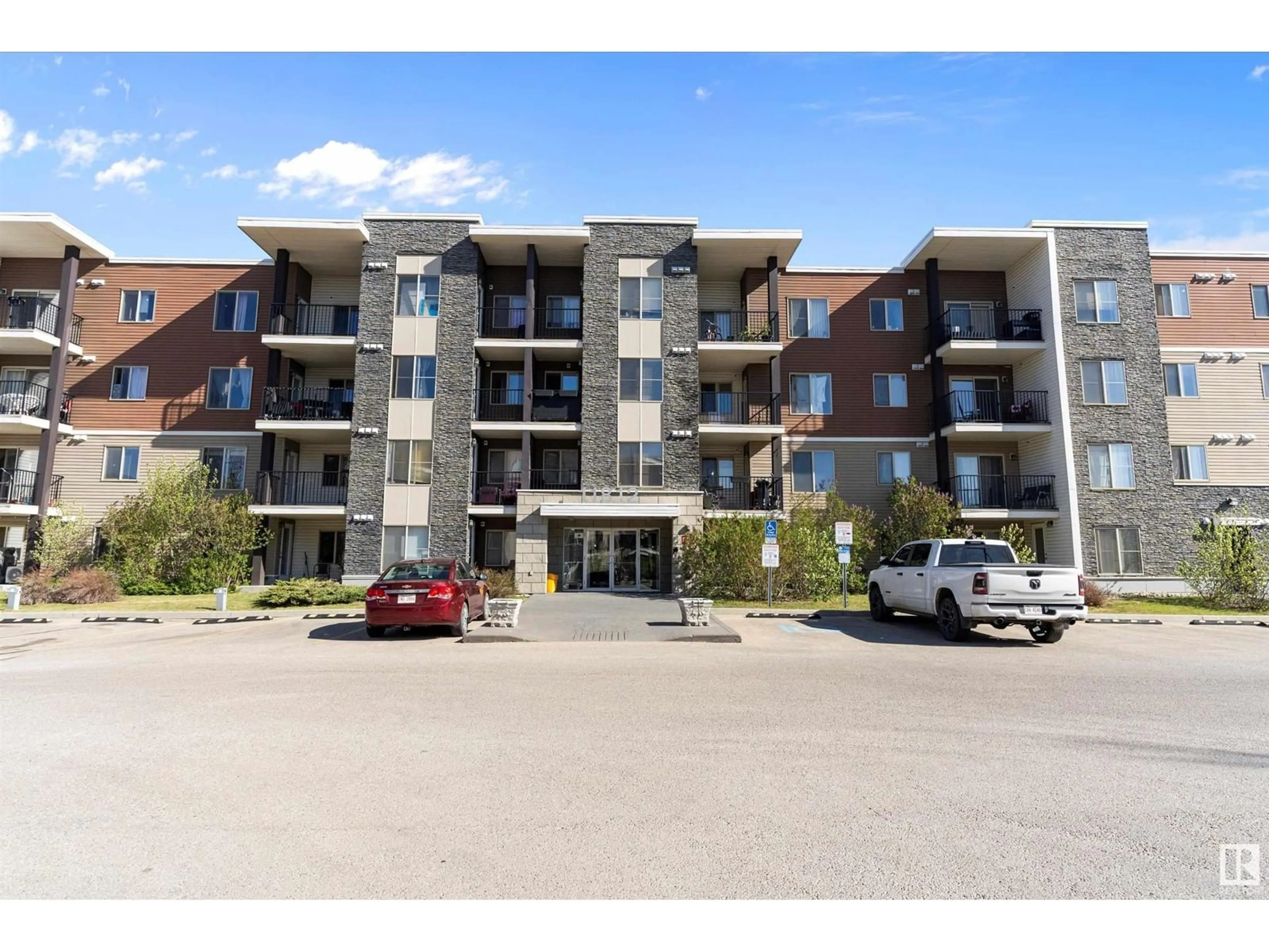 A pic from outside/outdoor area/front of a property/back of a property/a pic from drone, unknown for 205 11812 22 AV SW, Edmonton Alberta T6W2A2