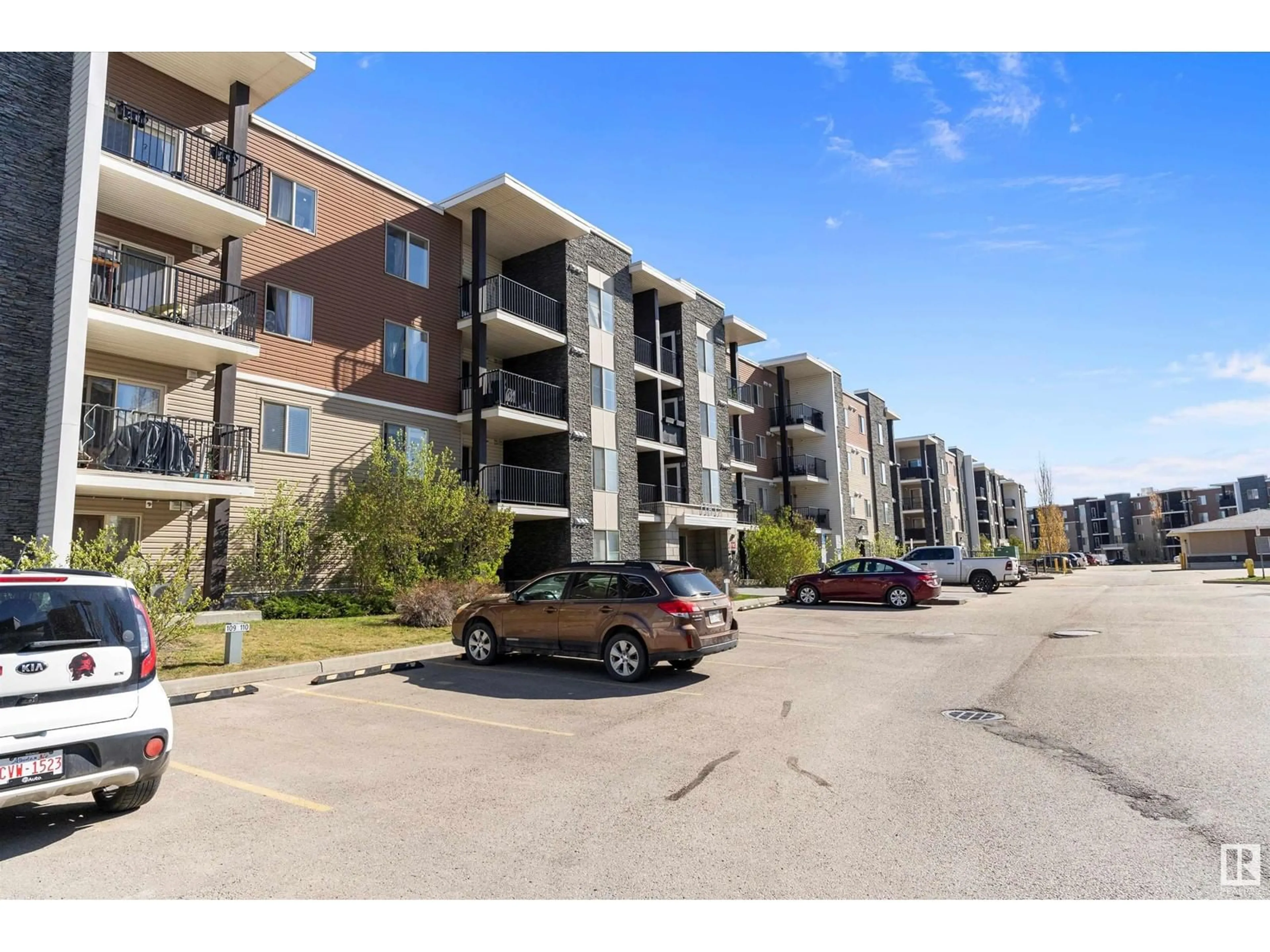 A pic from outside/outdoor area/front of a property/back of a property/a pic from drone, street for 205 11812 22 AV SW, Edmonton Alberta T6W2A2
