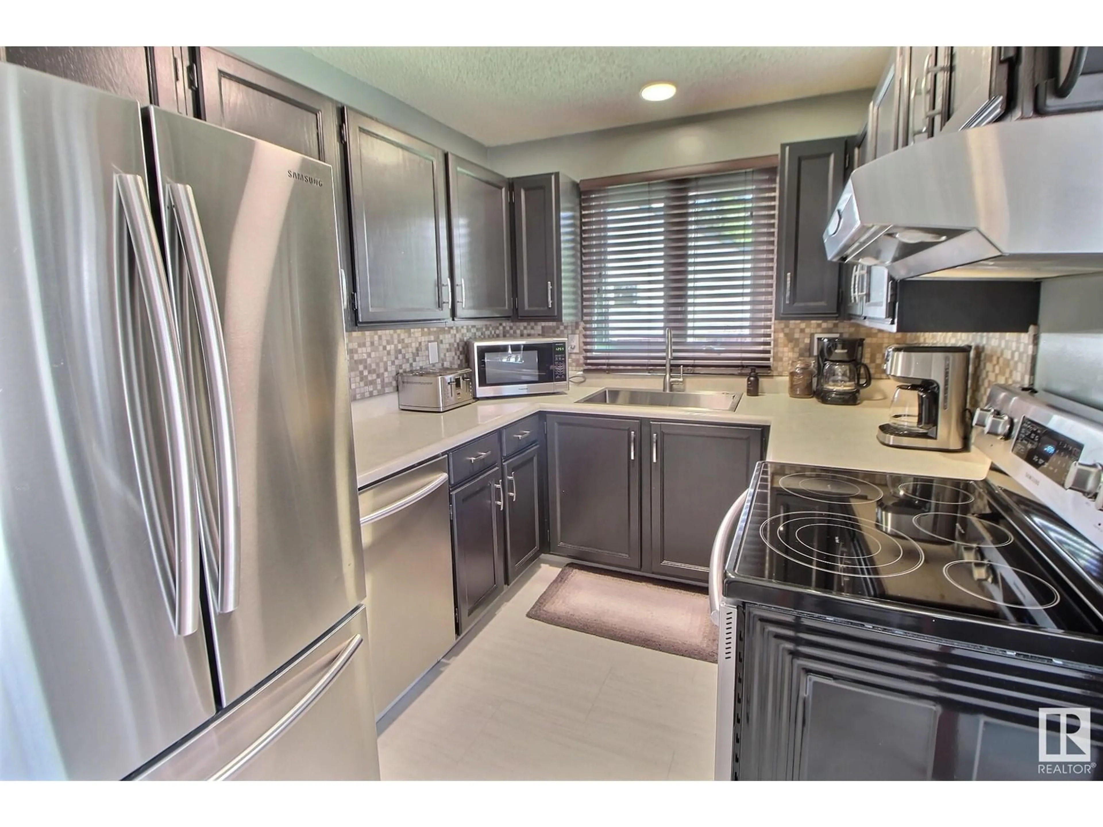 Standard kitchen, ceramic/tile floor for 2407 145 AV, Edmonton Alberta T5Y2J5