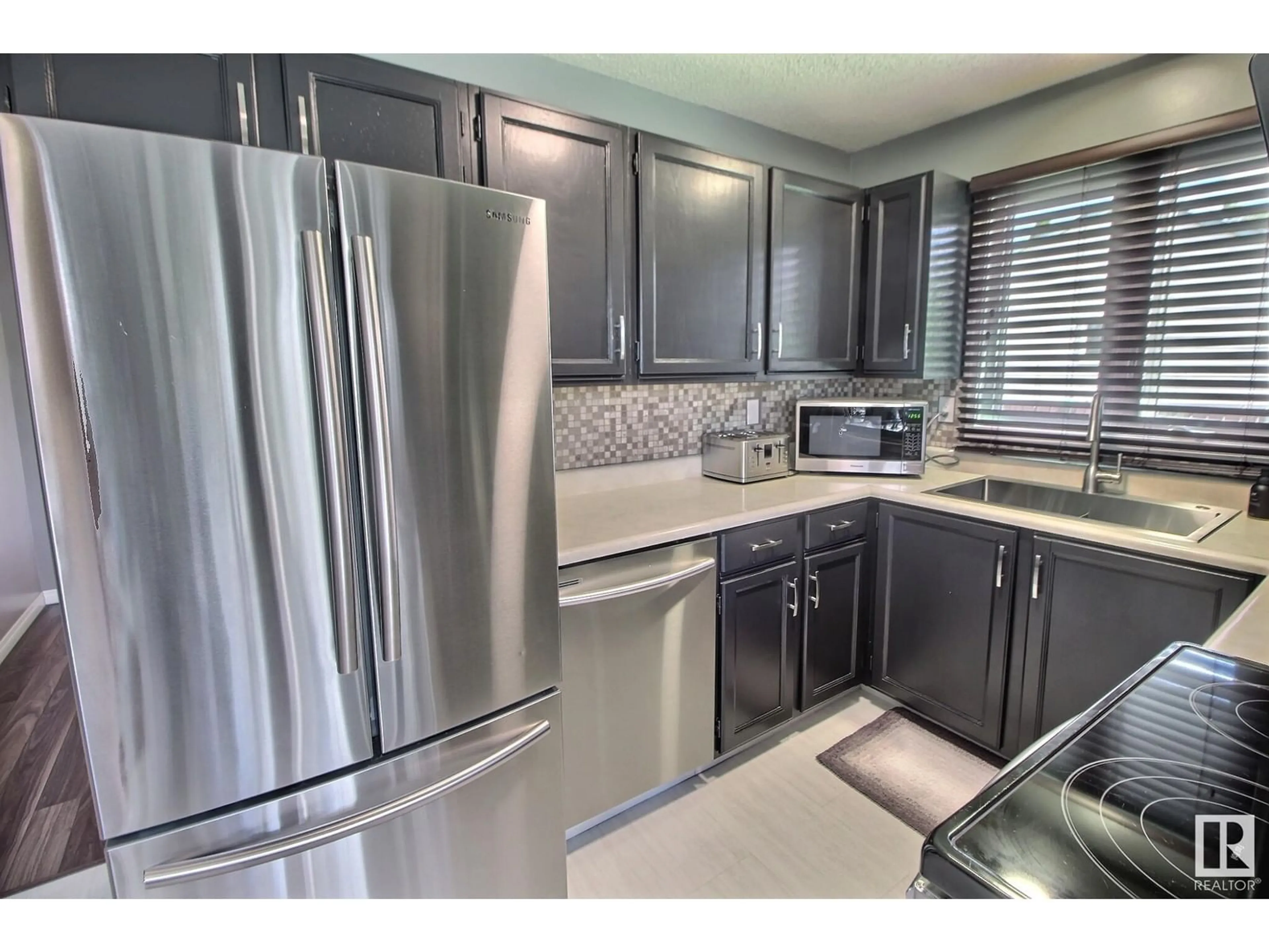 Standard kitchen, ceramic/tile floor for 2407 145 AV, Edmonton Alberta T5Y2J5