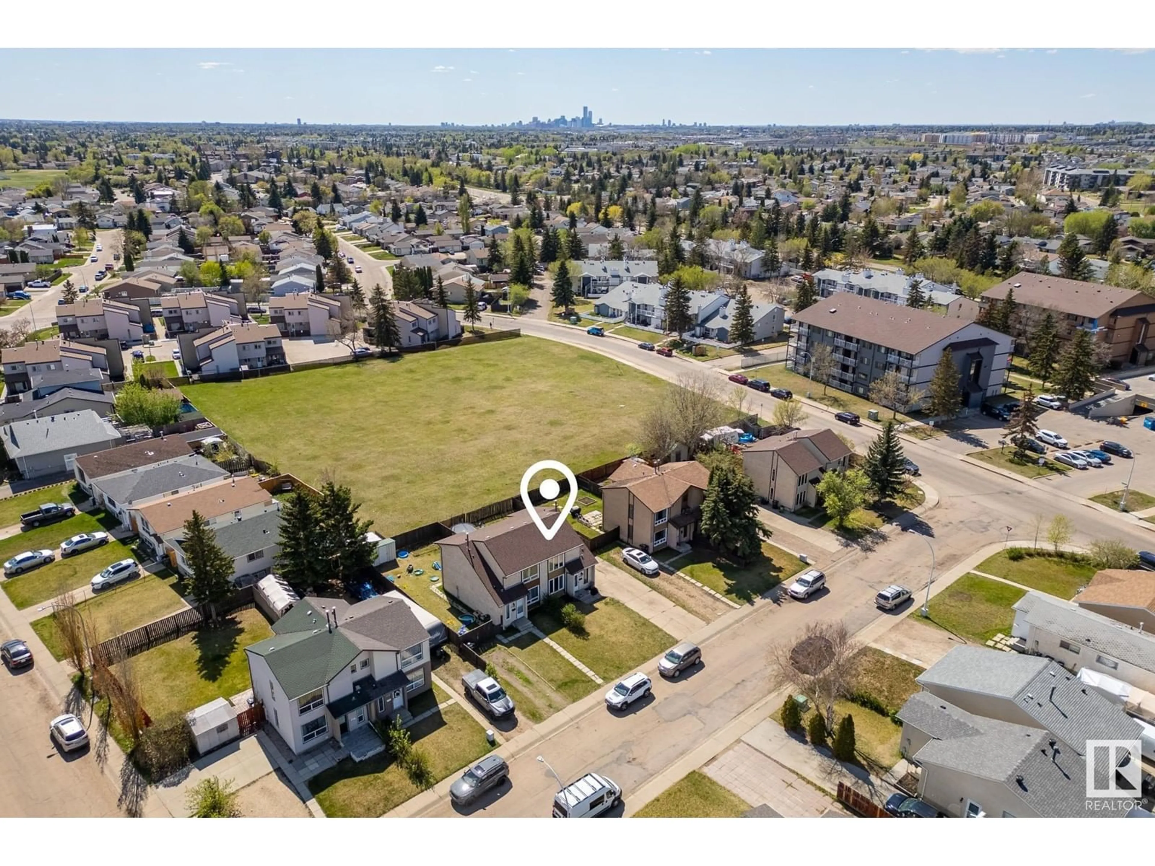 A pic from outside/outdoor area/front of a property/back of a property/a pic from drone, street for 2509 149 AV, Edmonton Alberta T5Y2G5