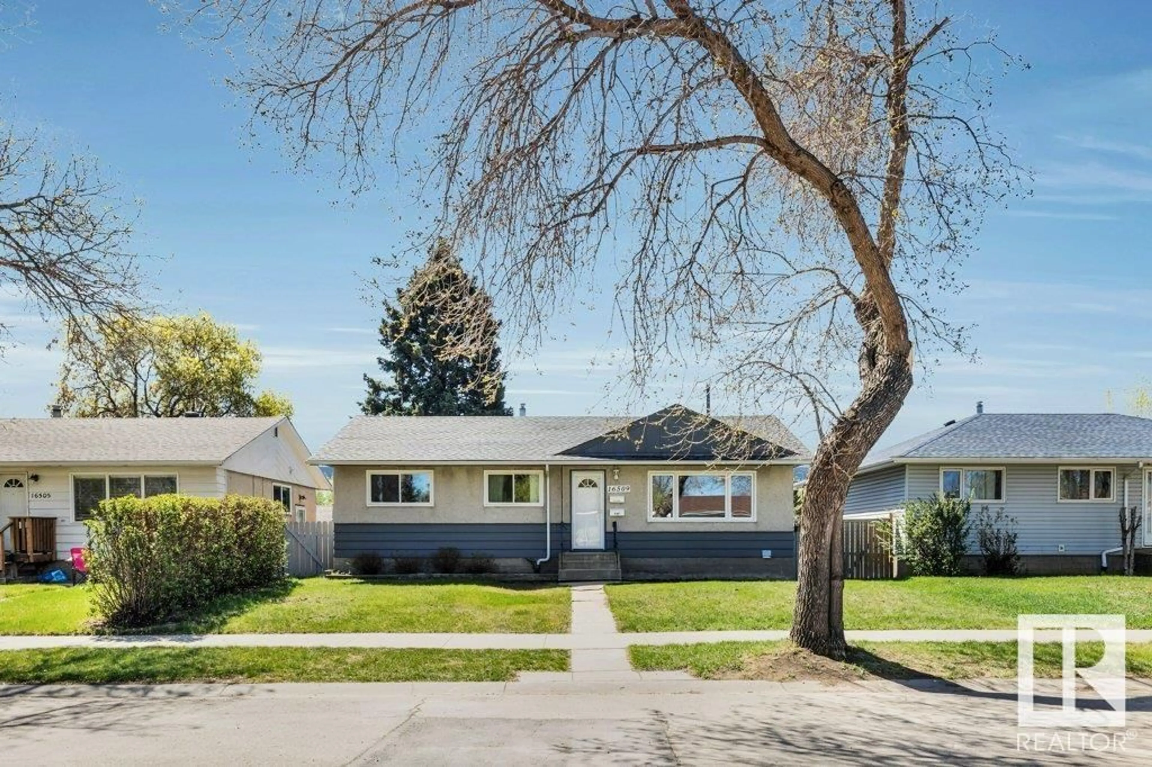 Home with vinyl exterior material, street for 16509 103 AV, Edmonton Alberta T5P0R1