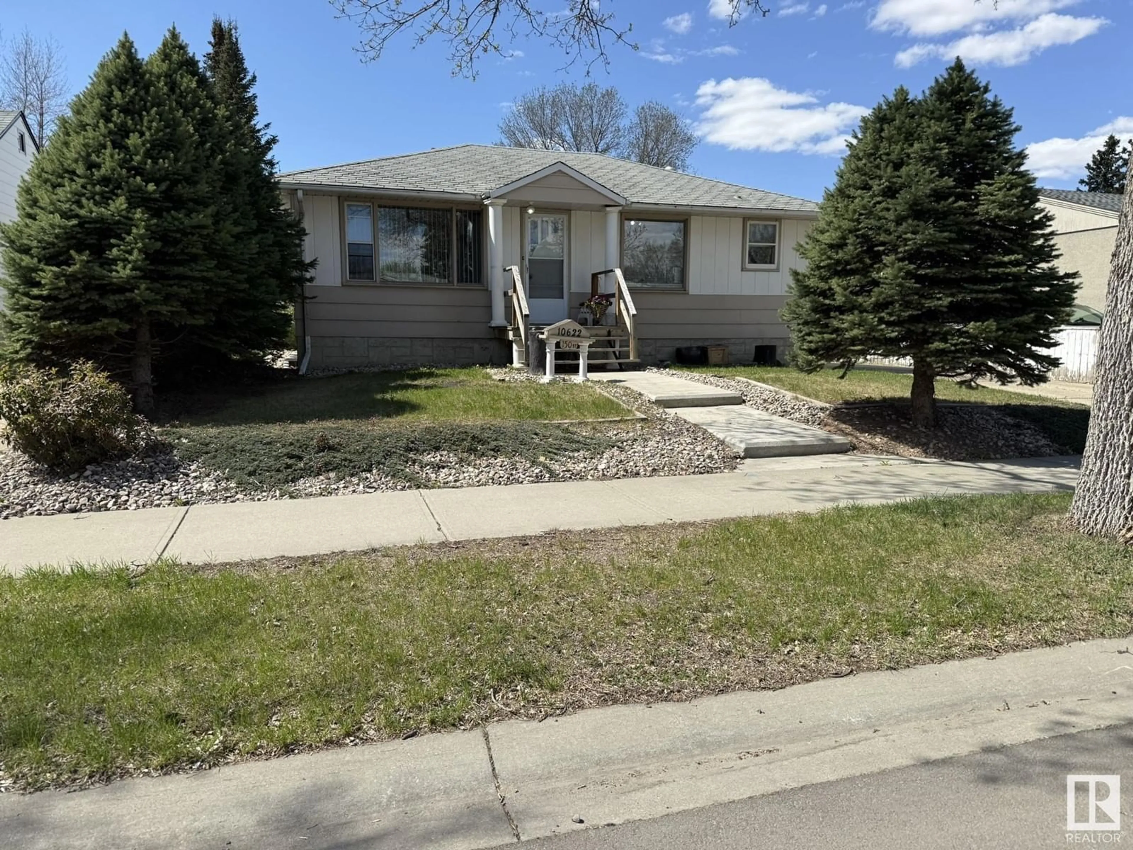 Home with vinyl exterior material, street for 10622 150 ST, Edmonton Alberta T5P1R2