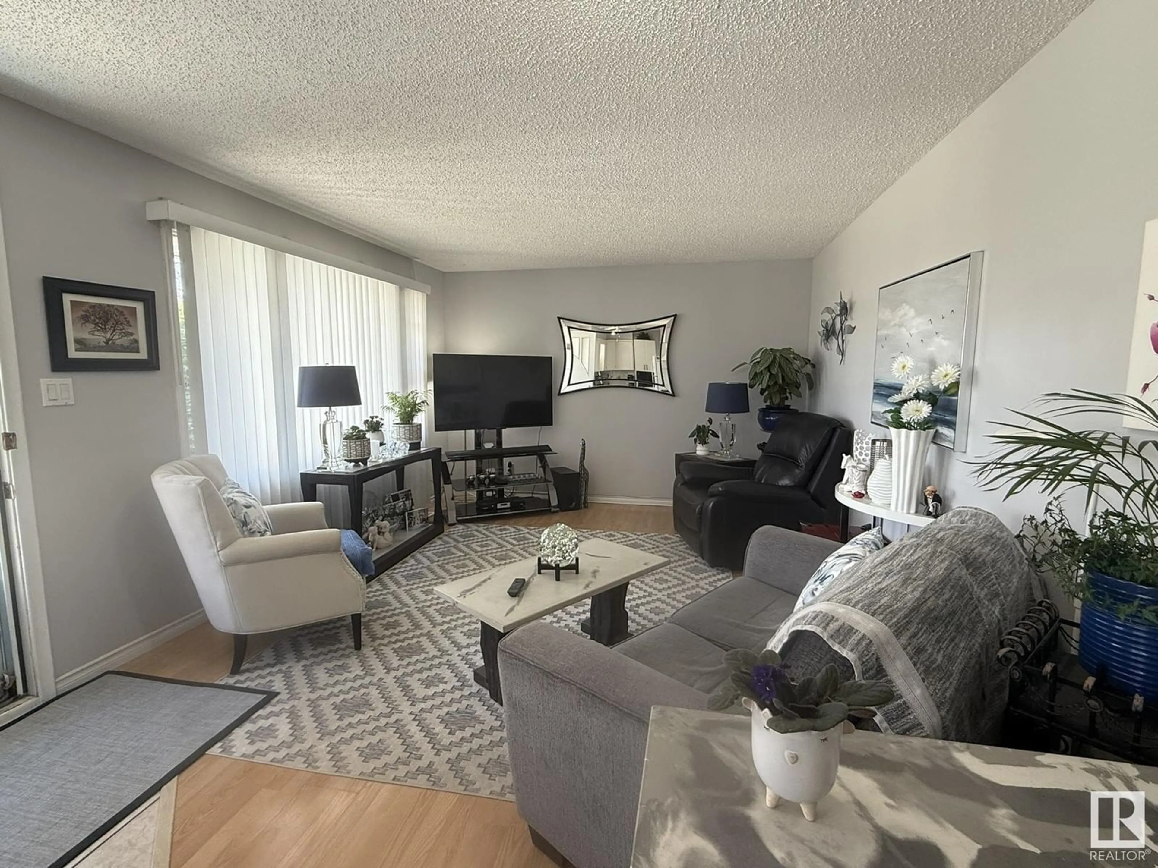 Living room with furniture, unknown for 10622 150 ST, Edmonton Alberta T5P1R2