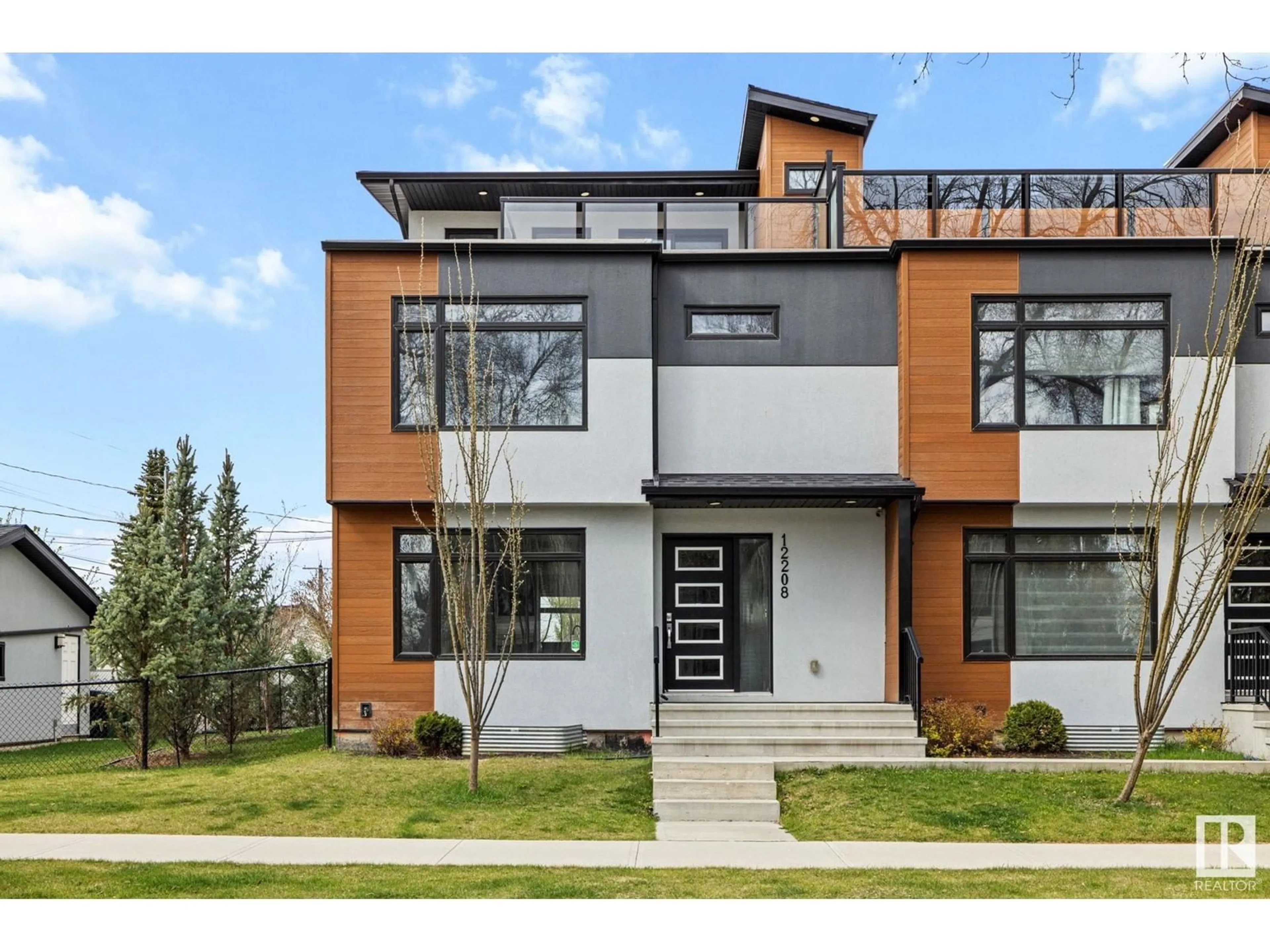 Home with brick exterior material, street for 12208 117 AV, Edmonton Alberta T5M0G8