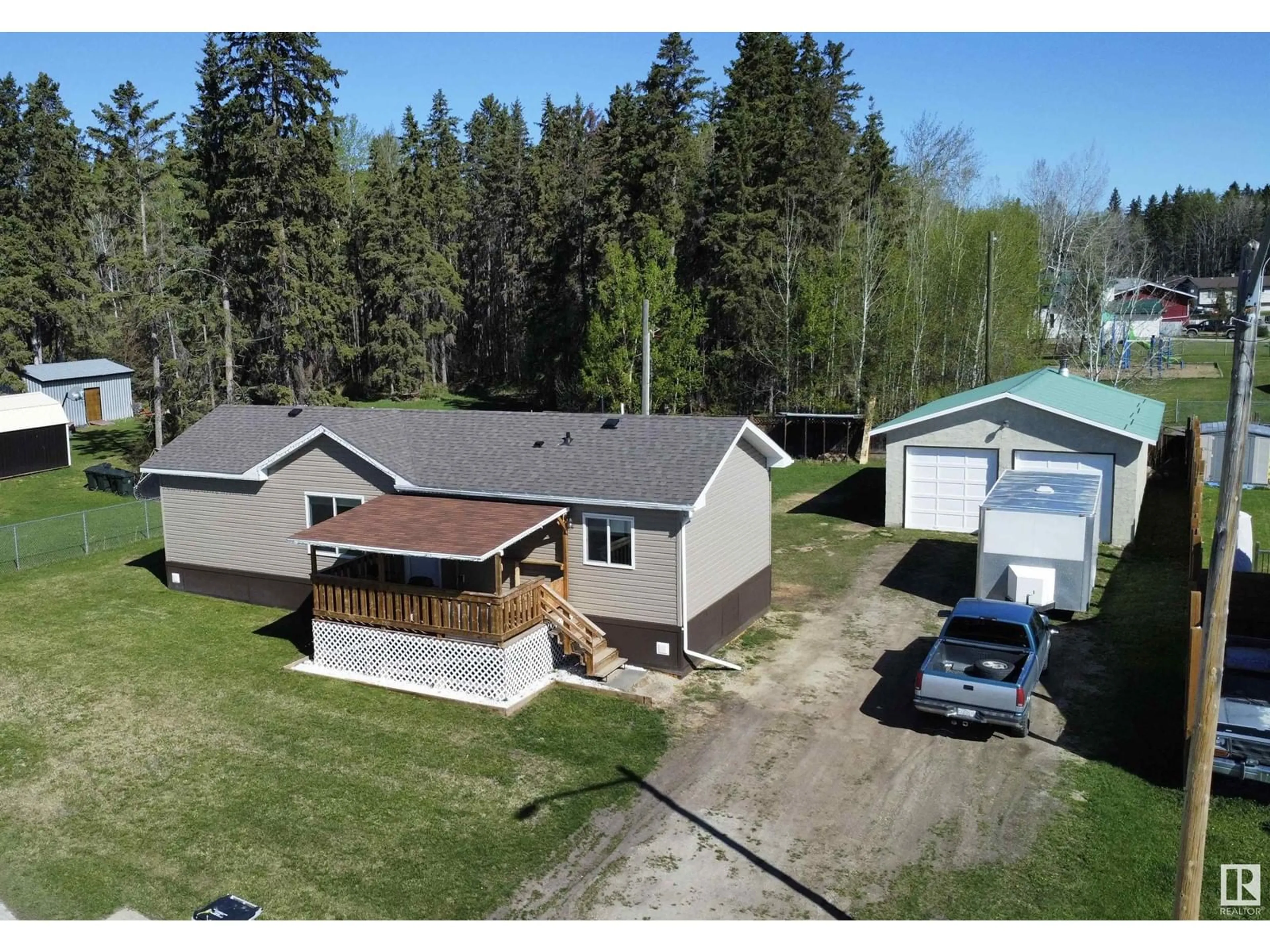A pic from outside/outdoor area/front of a property/back of a property/a pic from drone, building for 5028 54 AV, Wabamun Alberta T0E2K0
