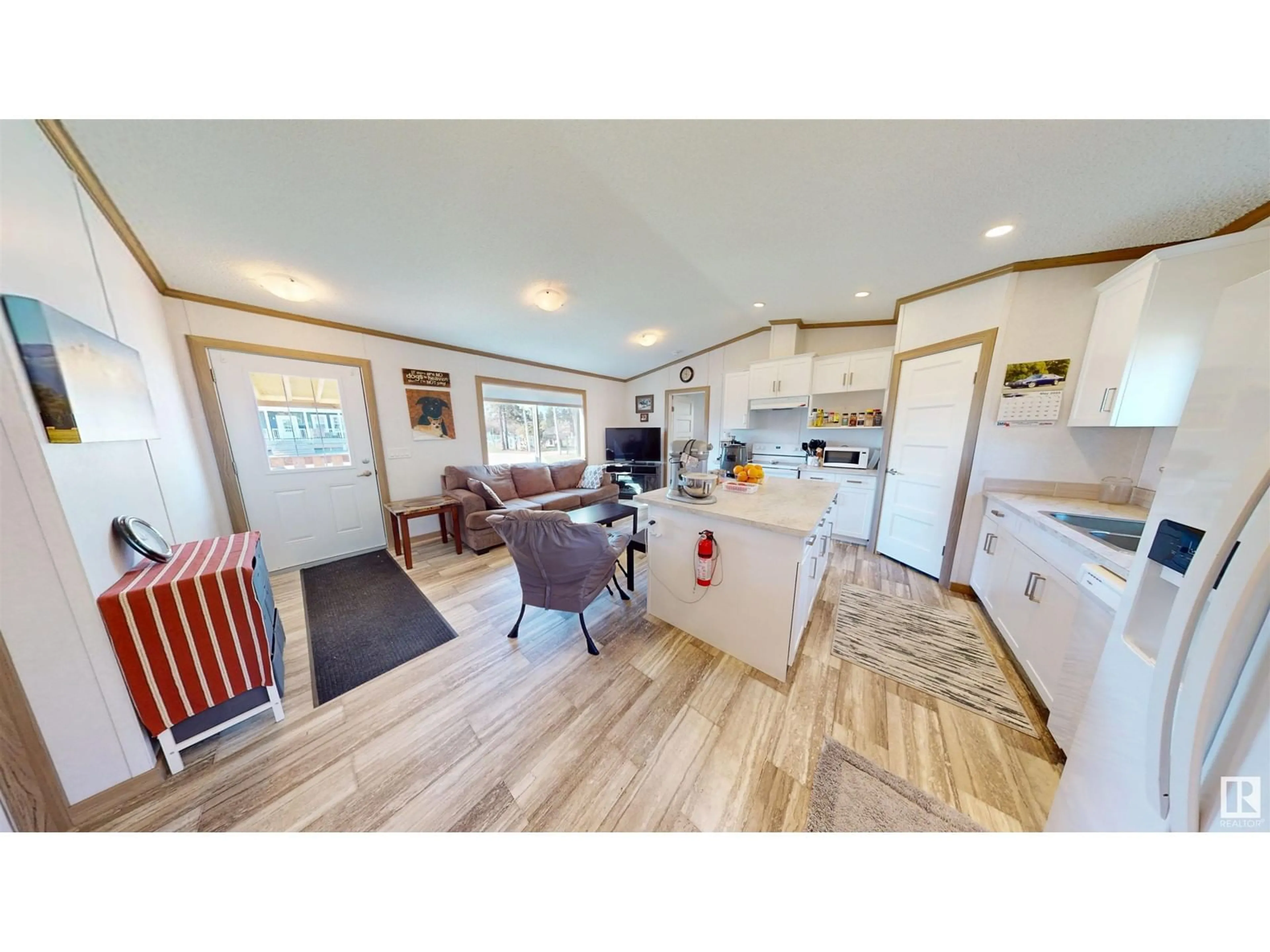 Open concept kitchen, wood/laminate floor for 5028 54 AV, Wabamun Alberta T0E2K0