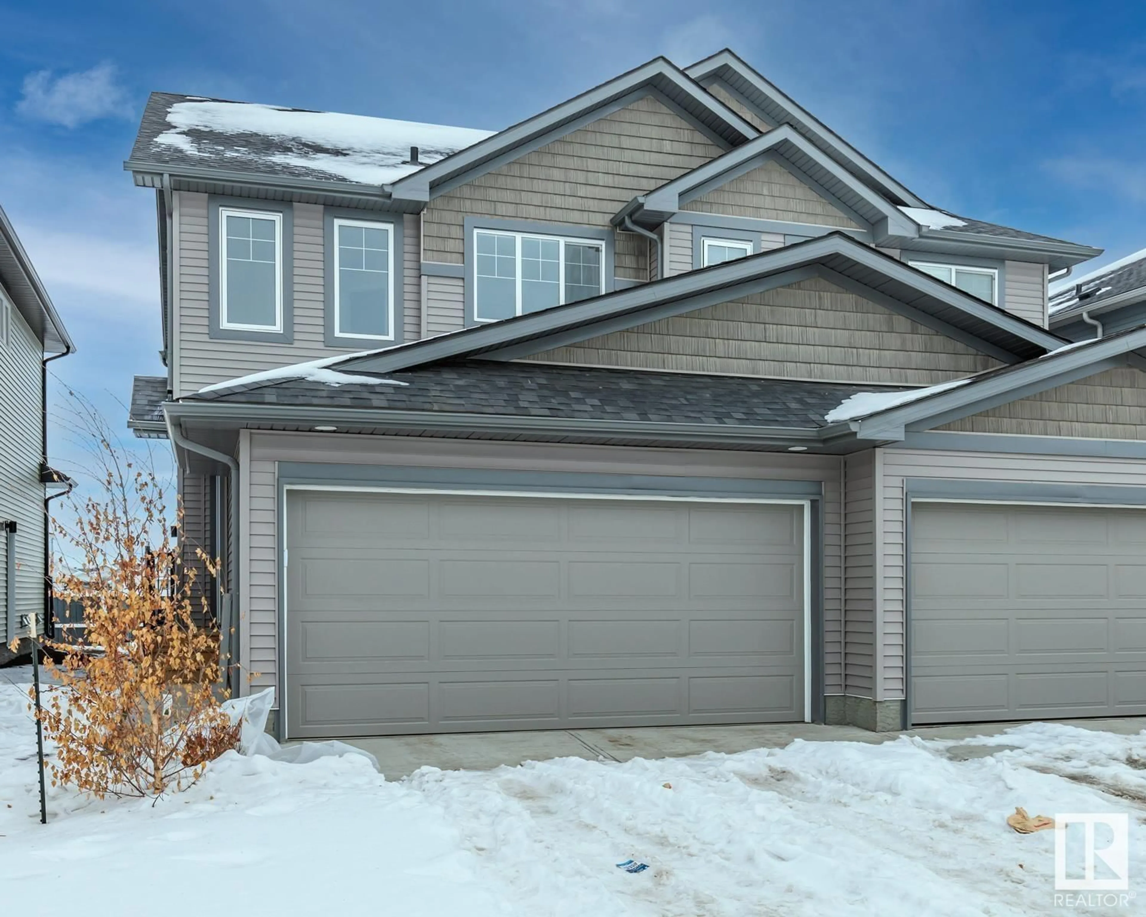 Home with vinyl exterior material, street for 15138 26 ST, Edmonton Alberta T5Y3Y5