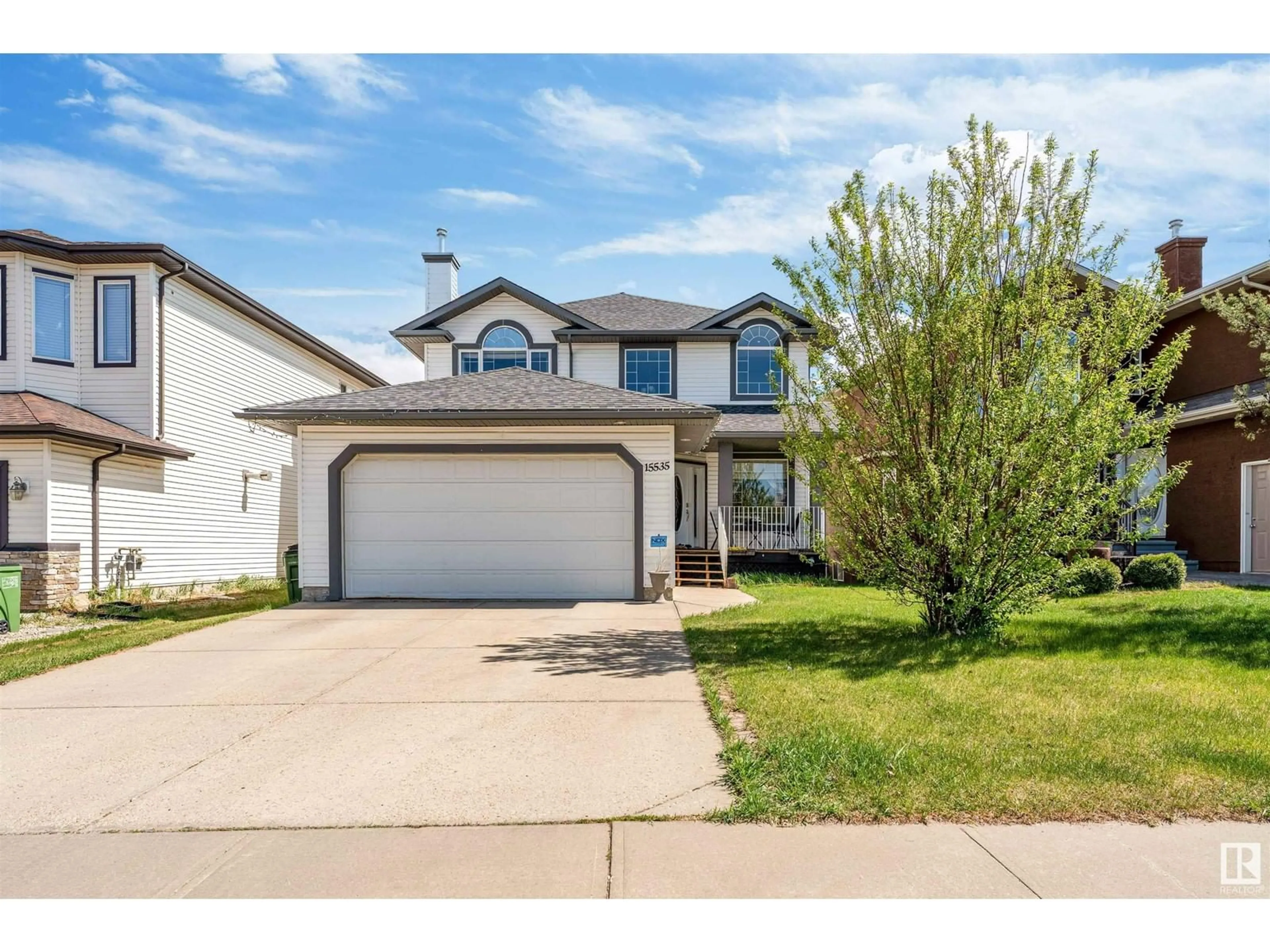 Home with vinyl exterior material, street for NW - 15535 48 ST, Edmonton Alberta T5Y0B5