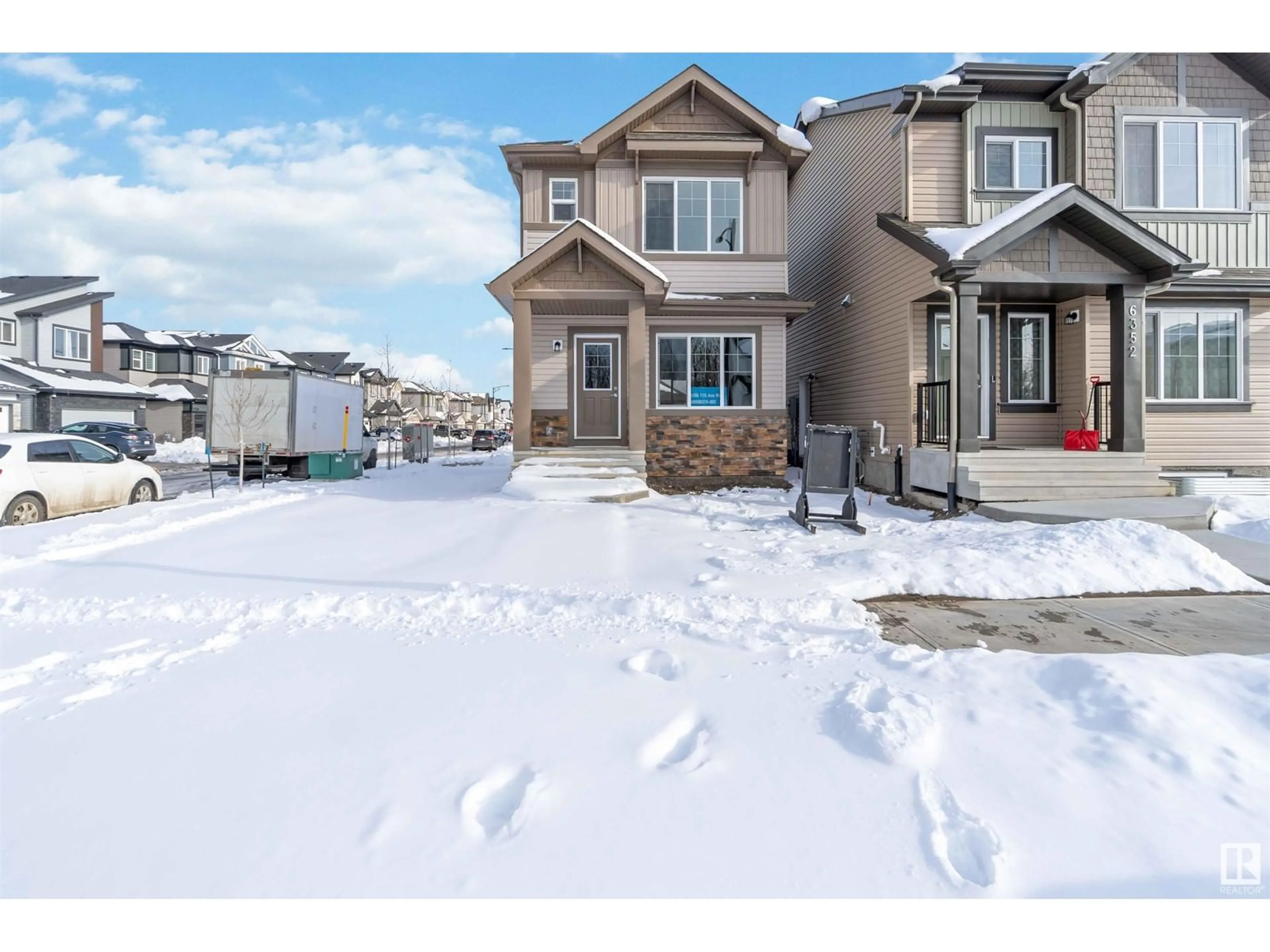 A pic from outside/outdoor area/front of a property/back of a property/a pic from drone, street for 6356 175 AV, Edmonton Alberta T5Y4H2
