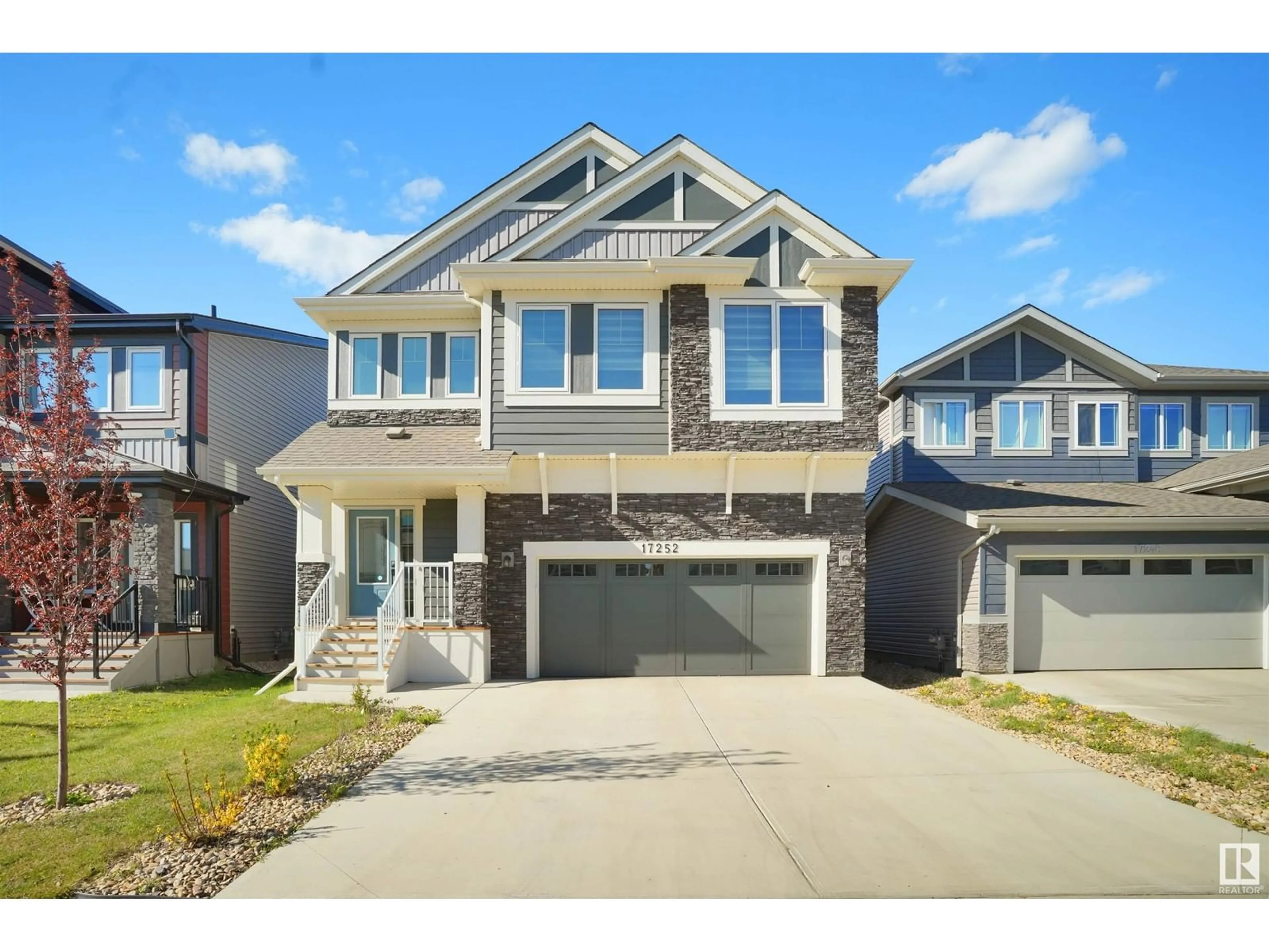 Home with vinyl exterior material, street for 17252 9 AV, Edmonton Alberta T6W3V4