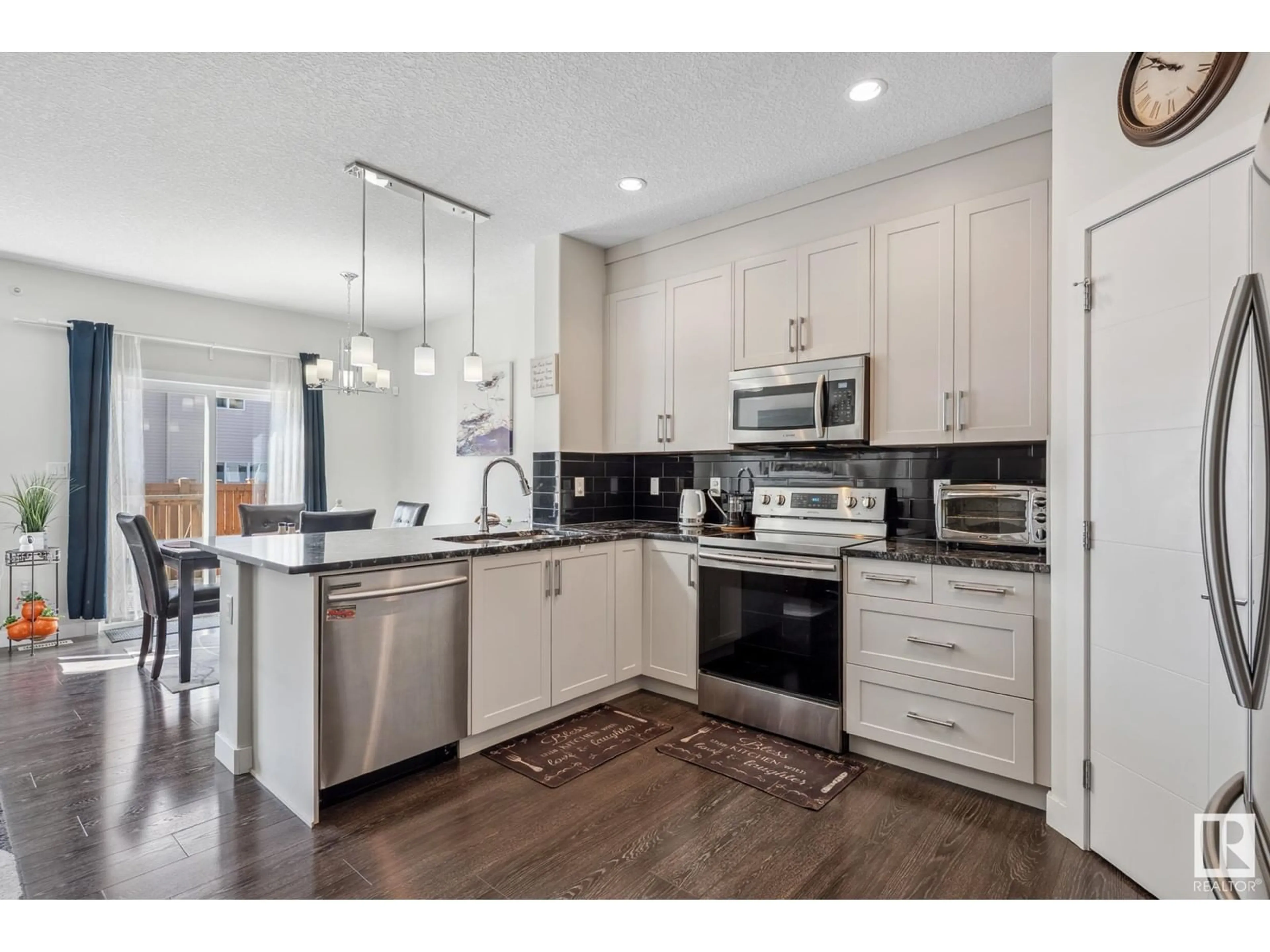 Open concept kitchen, unknown for 9164 COOPER CR, Edmonton Alberta T6W3K9