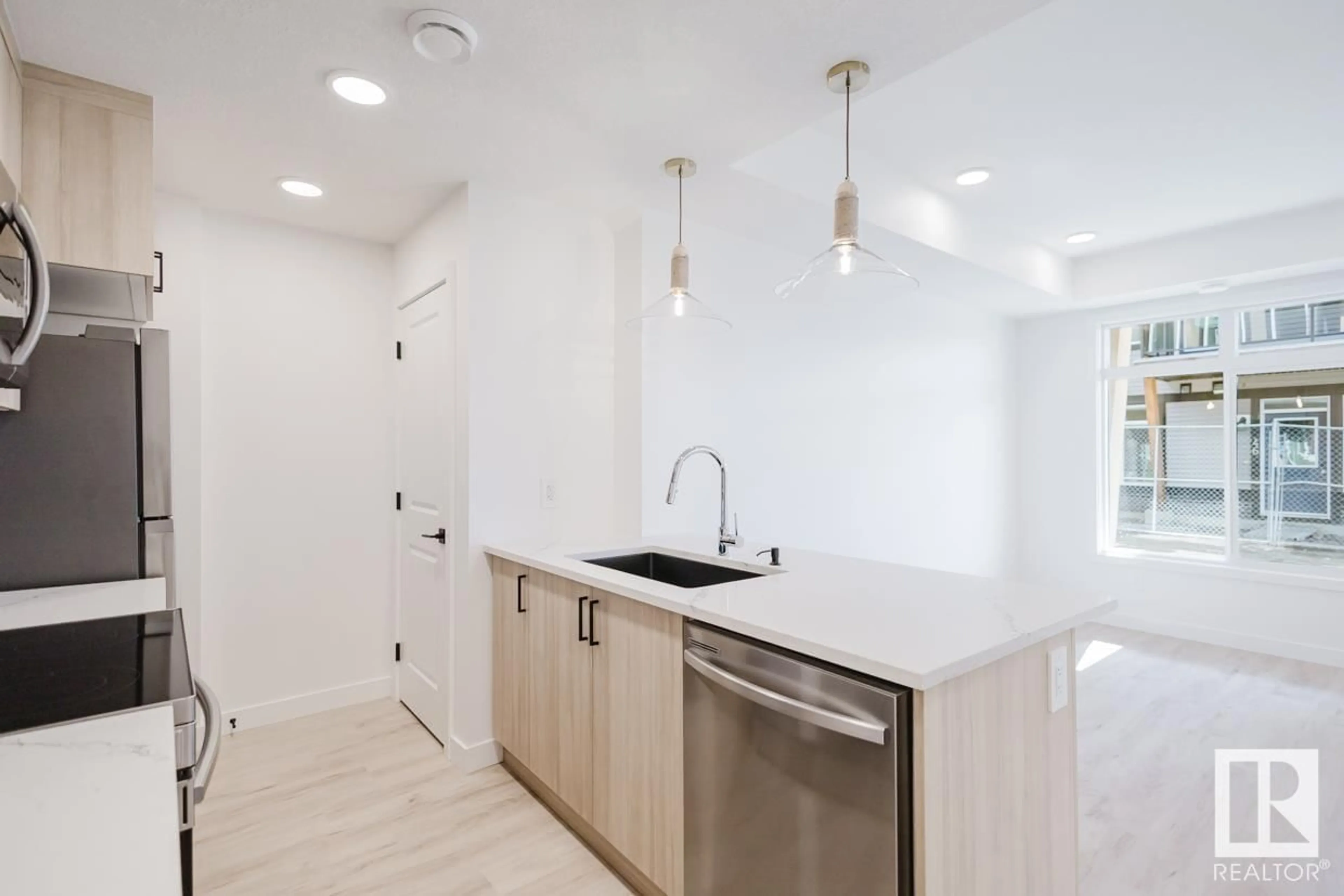 Open concept kitchen, unknown for 30 16231 19 AV SW, Edmonton Alberta T6W5C6