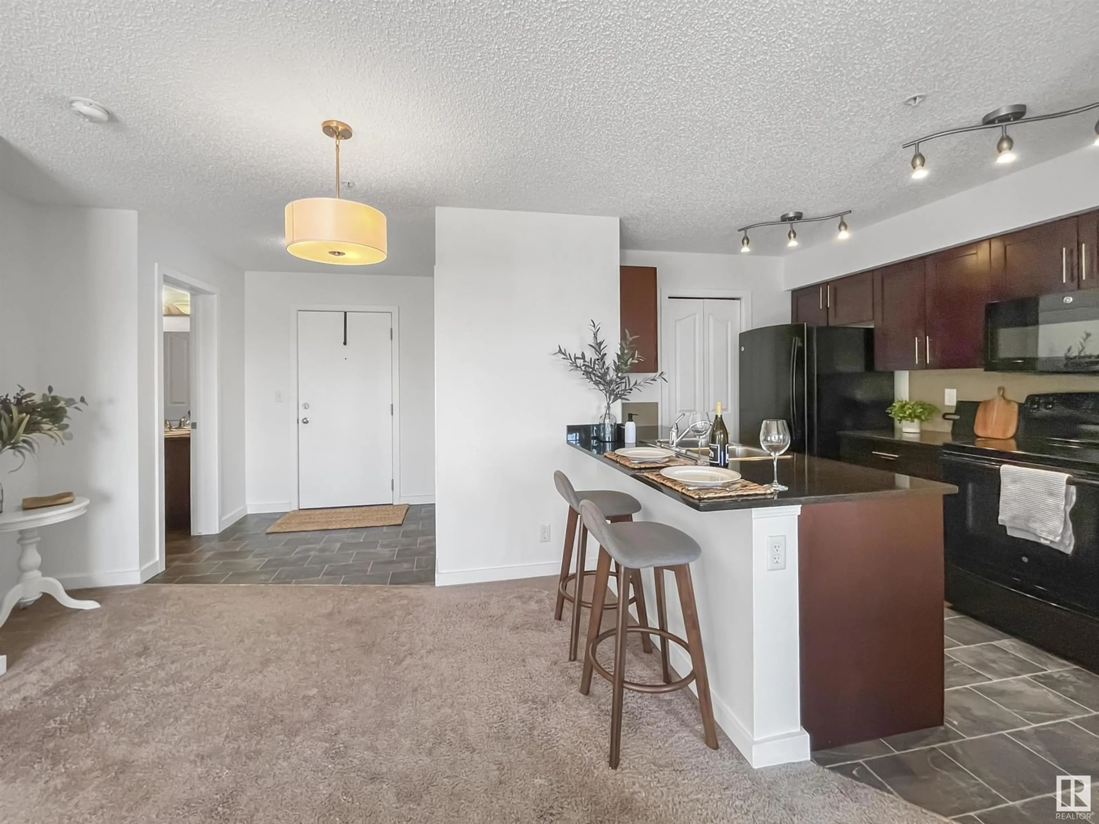 Open concept kitchen, unknown for 306 - 12045 22 AVE SW, Edmonton Alberta T6W2Y2