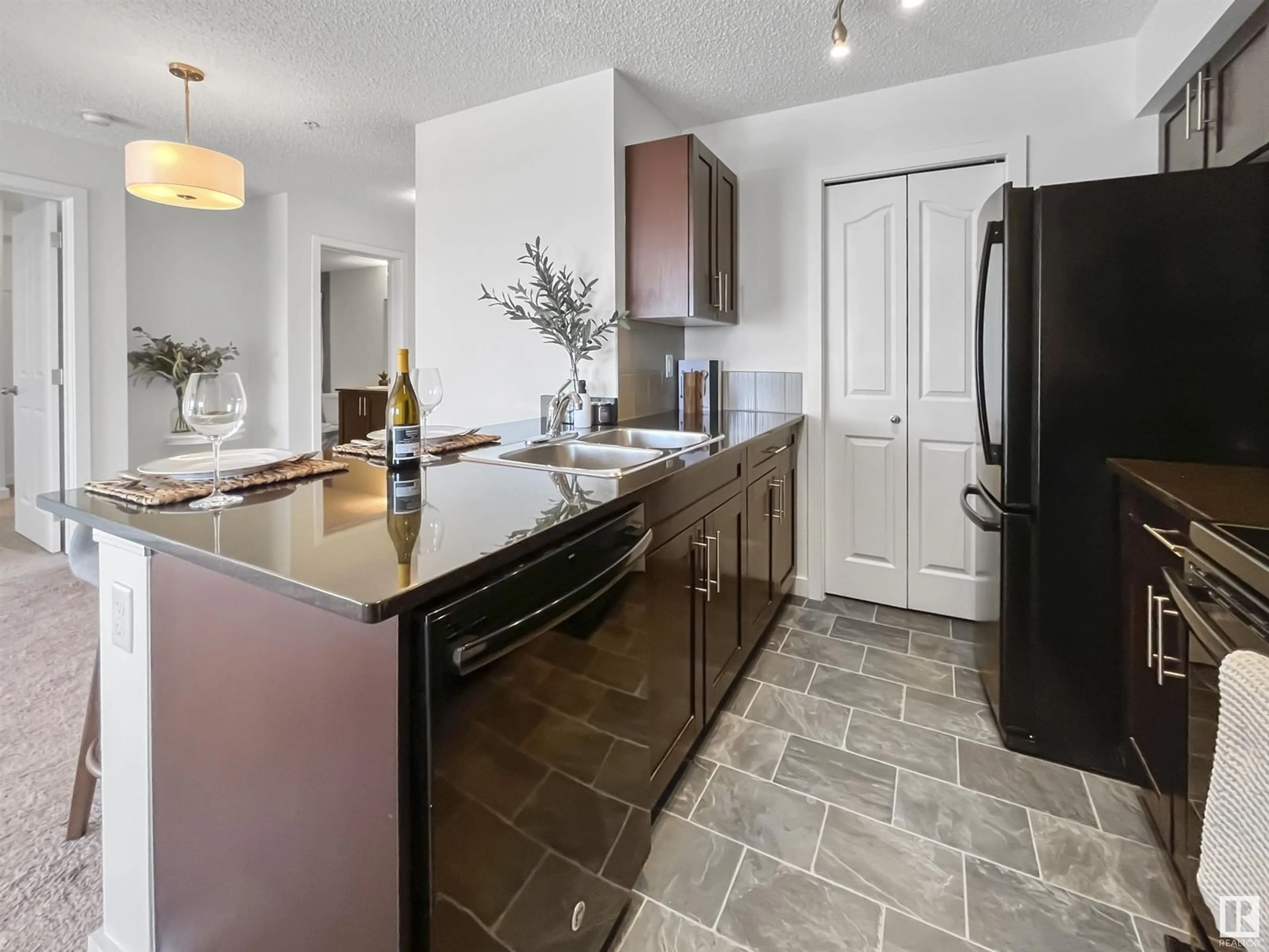 Open concept kitchen, ceramic/tile floor for 306 - 12045 22 AVE SW, Edmonton Alberta T6W2Y2