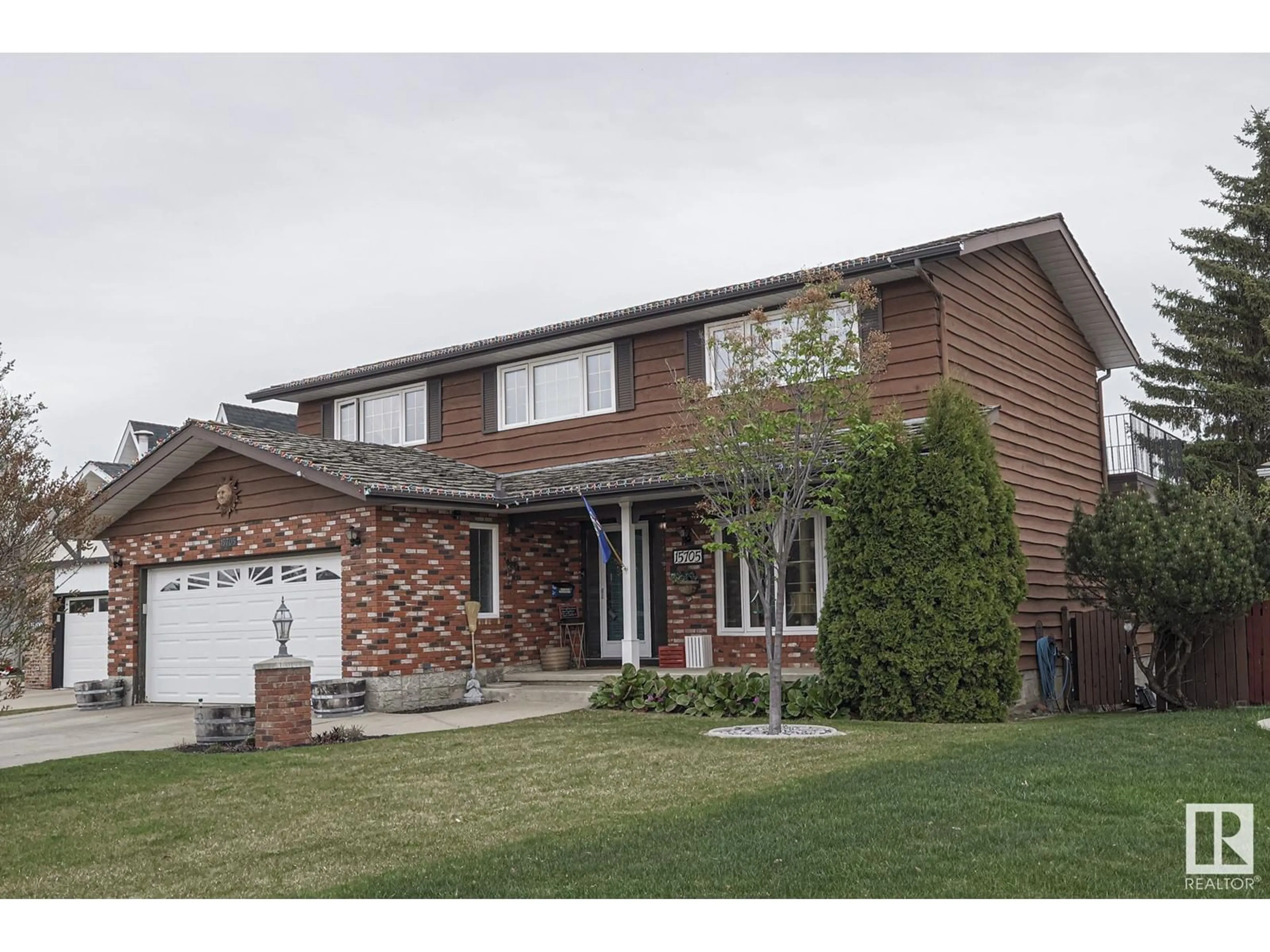 Home with brick exterior material, street for 15705 111 ST, Edmonton Alberta T5X4S3
