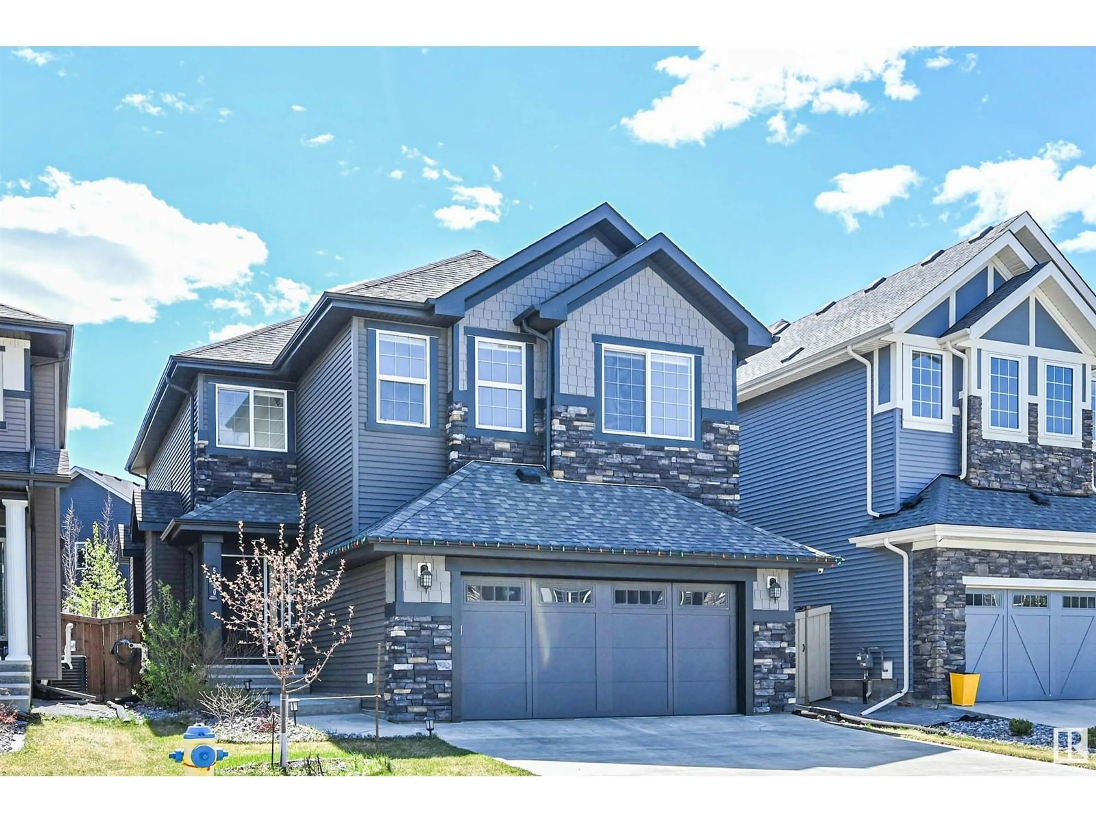 Home with vinyl exterior material, street for 5750 KEEPING CR, Edmonton Alberta T6W0S5