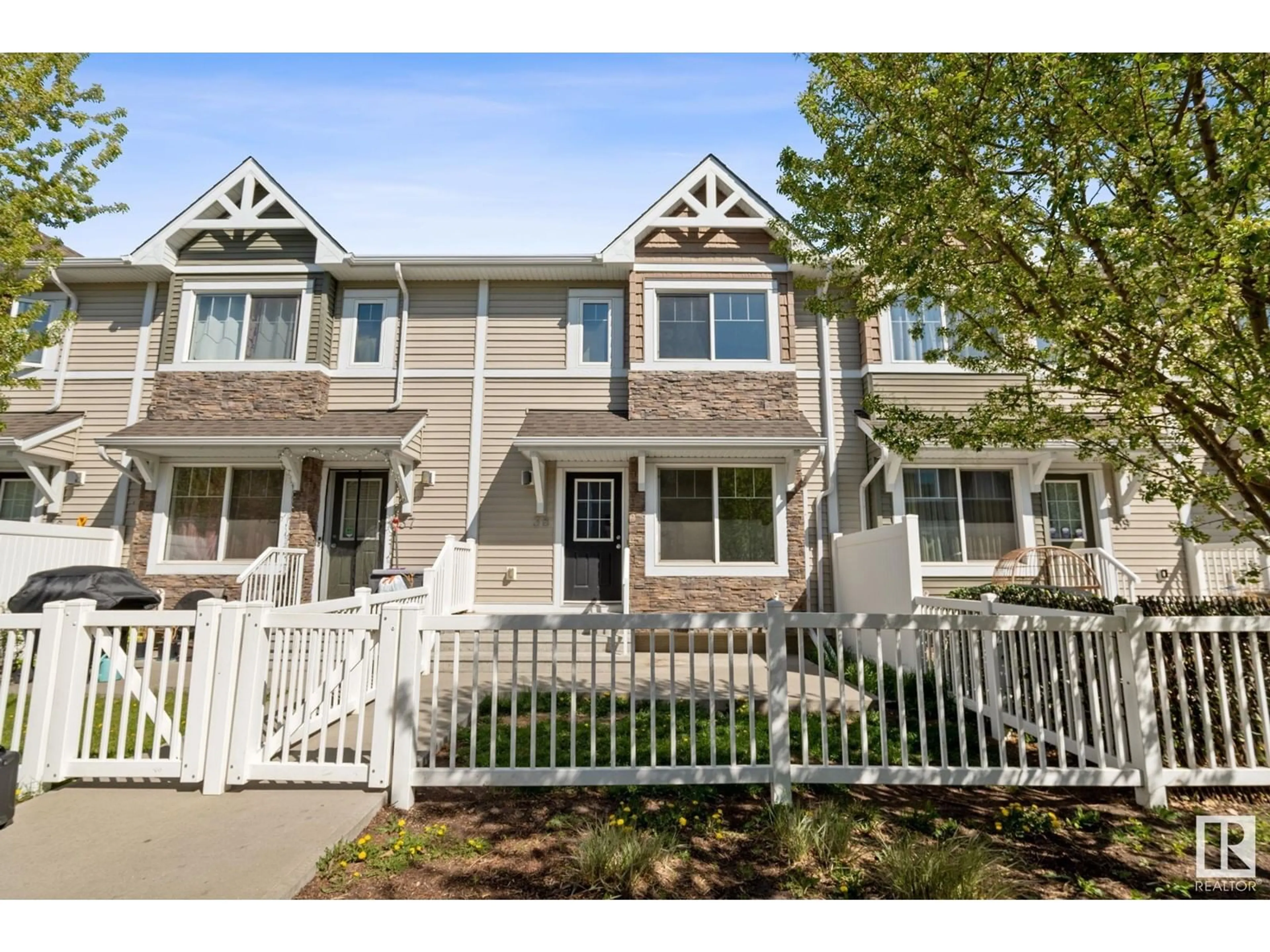 Home with vinyl exterior material, street for 38 CLAREVIEW RD, Edmonton Alberta T5A0Z6