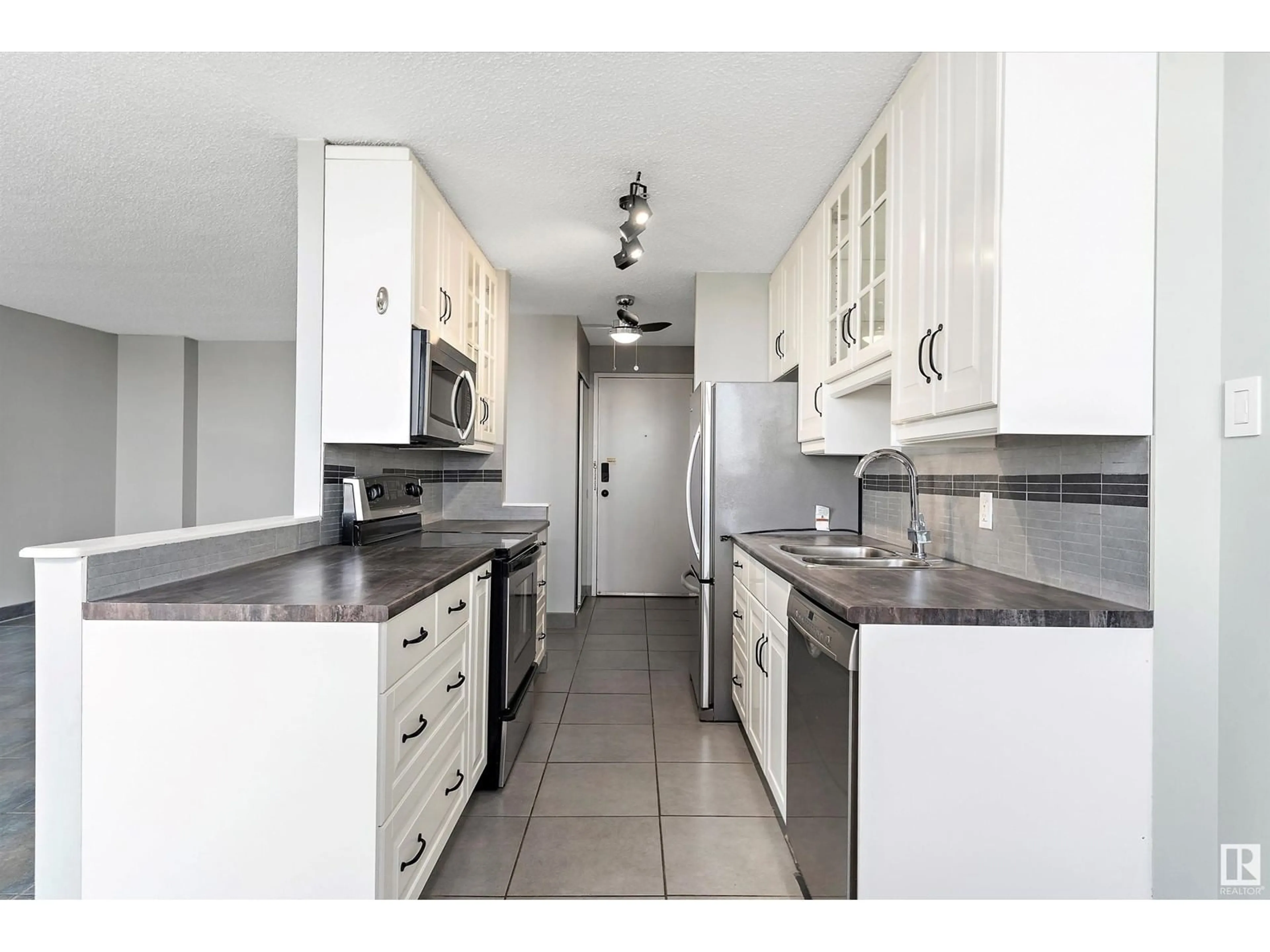 Standard kitchen, ceramic/tile floor for #1504 - 10135 SASKATCHEWAN DR, Edmonton Alberta T6E4Y9