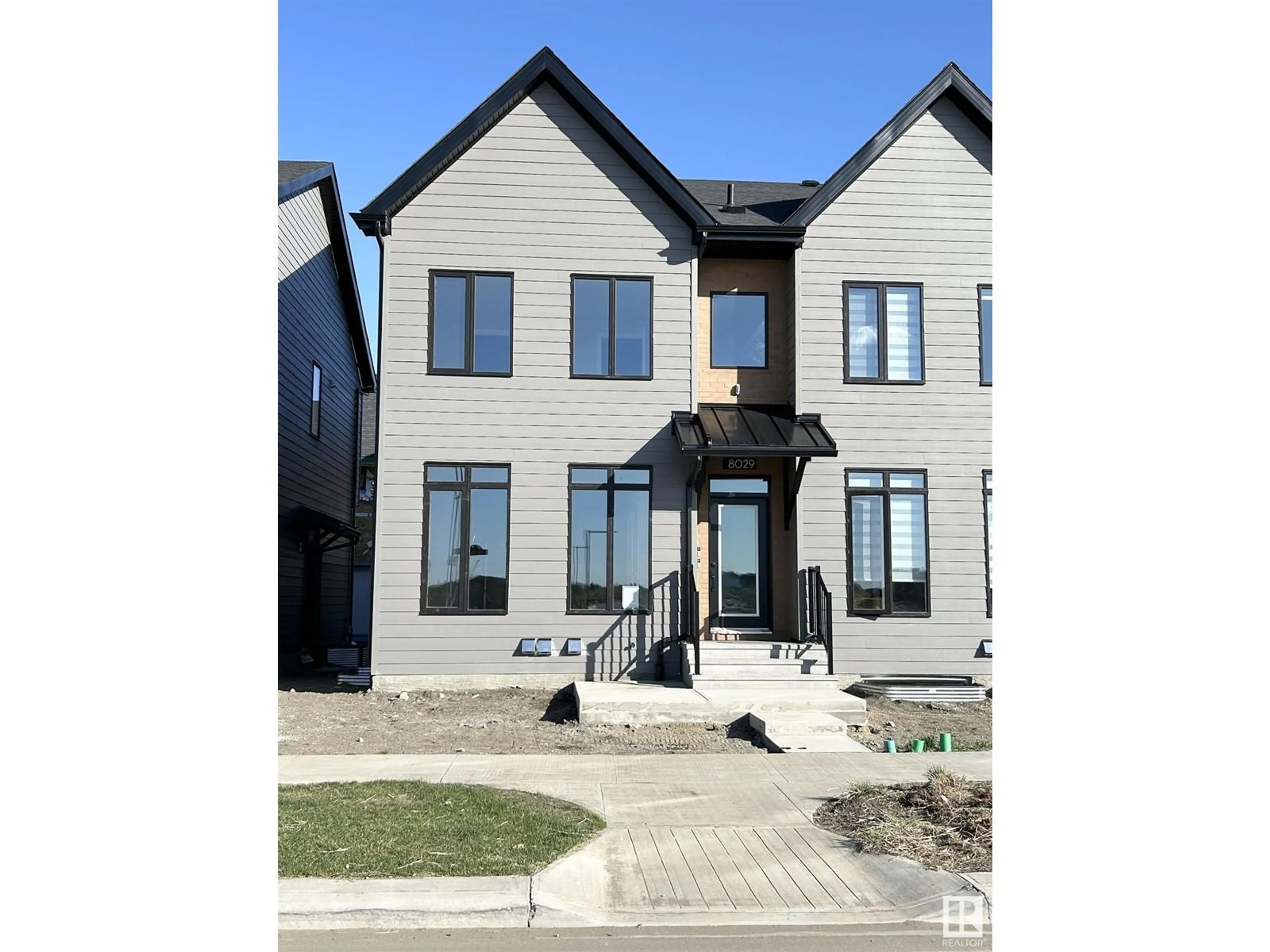 Home with brick exterior material, street for 8029 CEDRIC MAH RD, Edmonton Alberta T5G2Z5