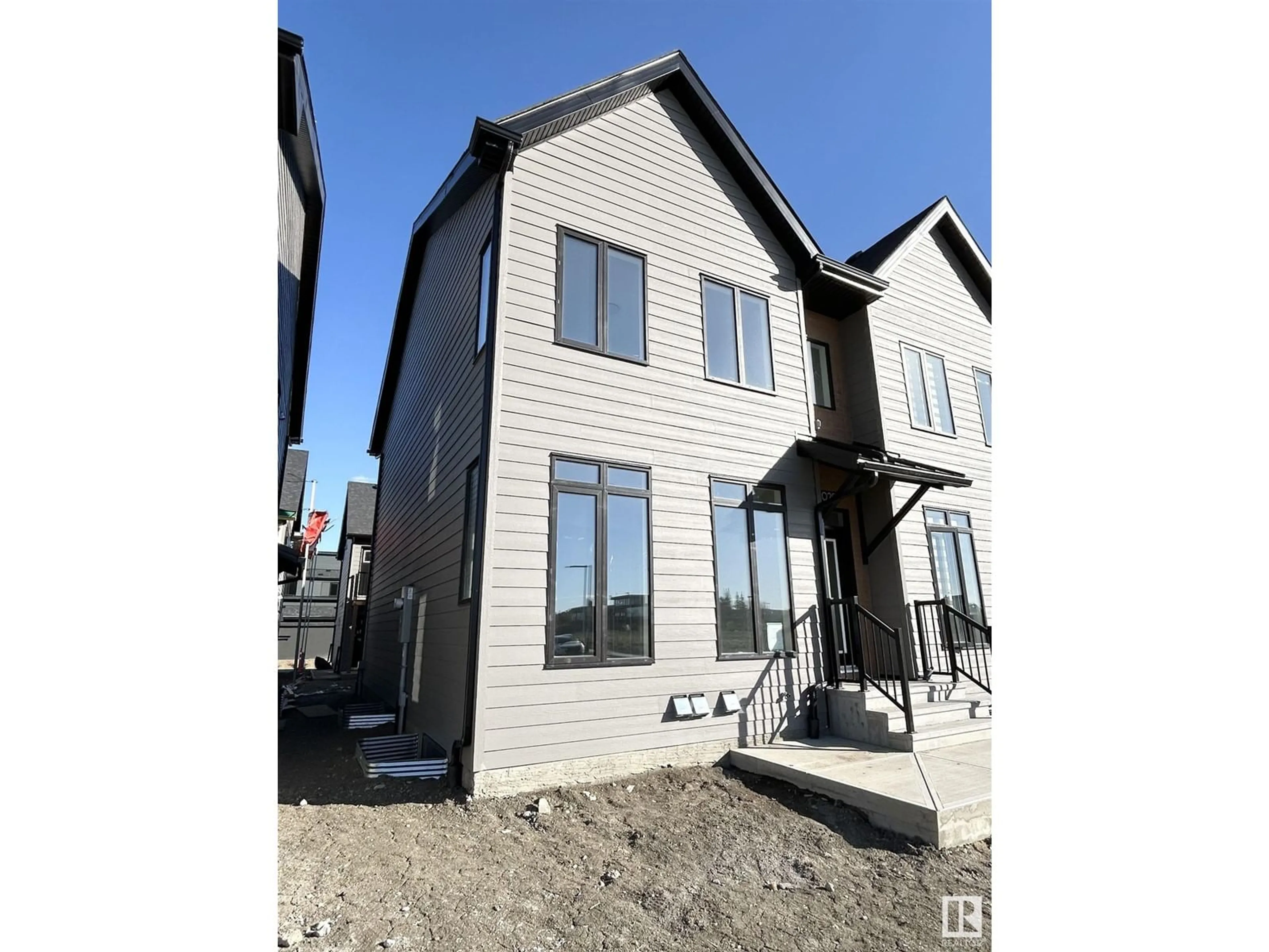 Home with brick exterior material, building for 8029 CEDRIC MAH RD, Edmonton Alberta T5G2Z5
