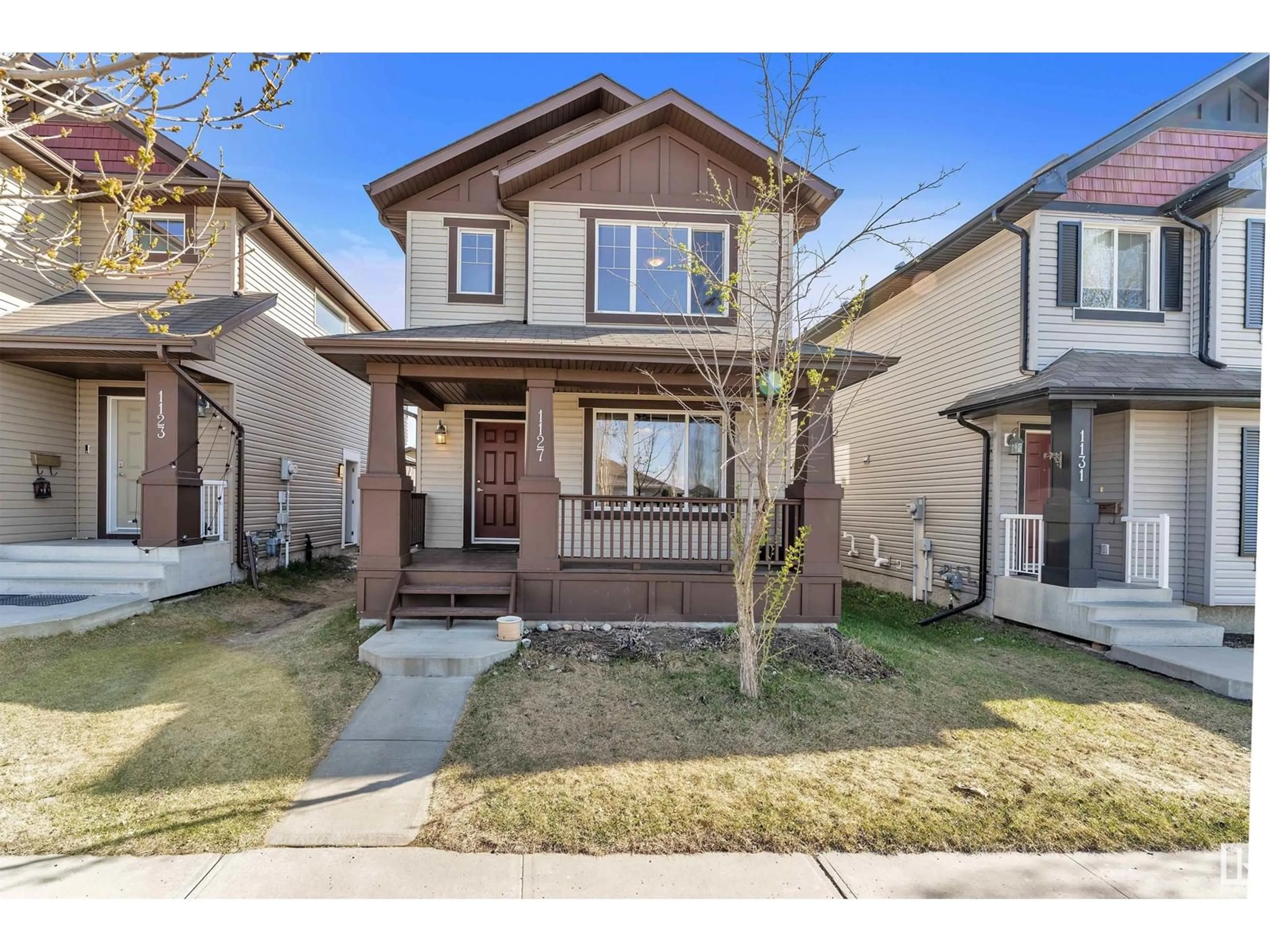 Home with brick exterior material, street for 1127 35 AV, Edmonton Alberta T6T0J8