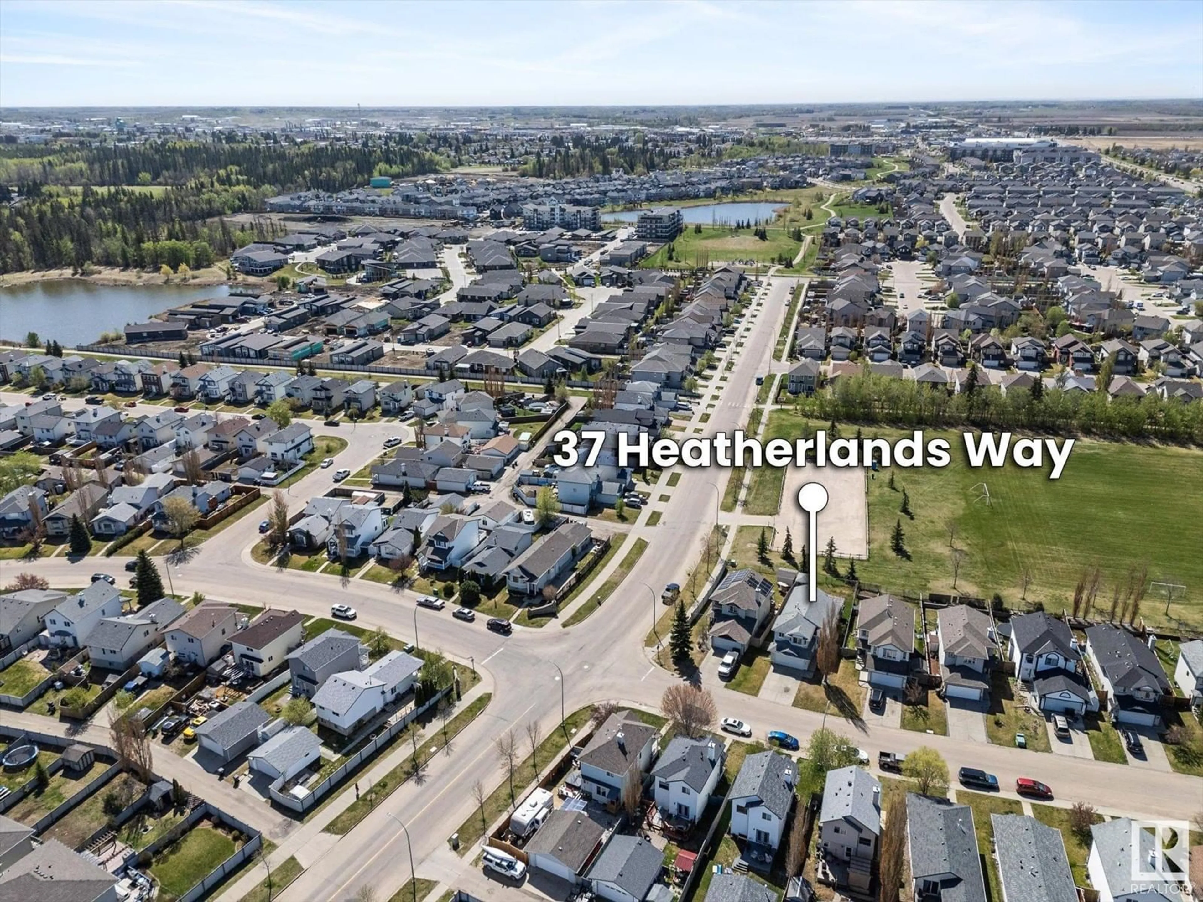 A pic from outside/outdoor area/front of a property/back of a property/a pic from drone, water/lake/river/ocean view for 37 HEATHERLANDS WY, Spruce Grove Alberta T7X4L2