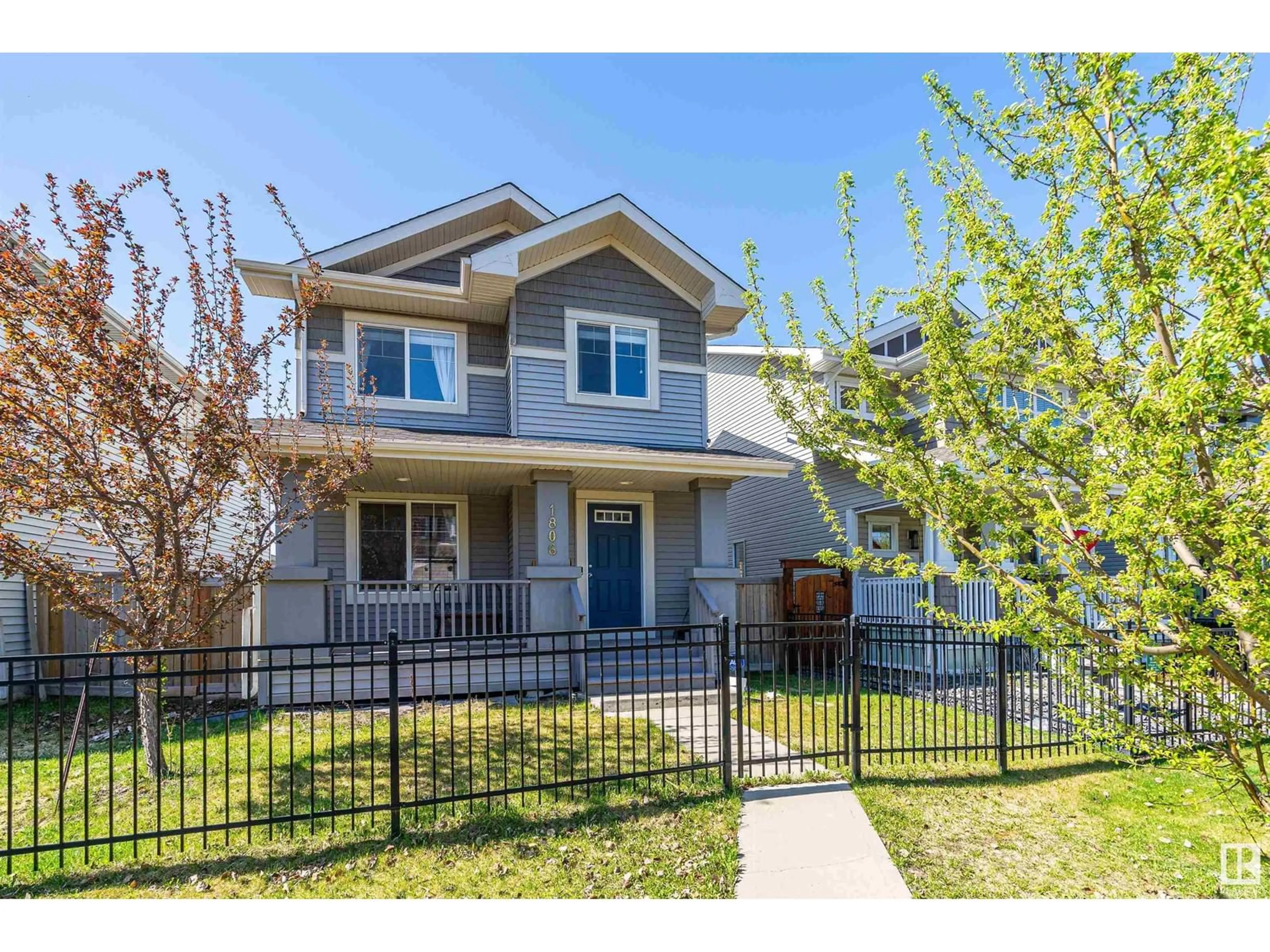 Home with vinyl exterior material, street for 1806 CARRUTHERS LN, Edmonton Alberta T6W0Z1