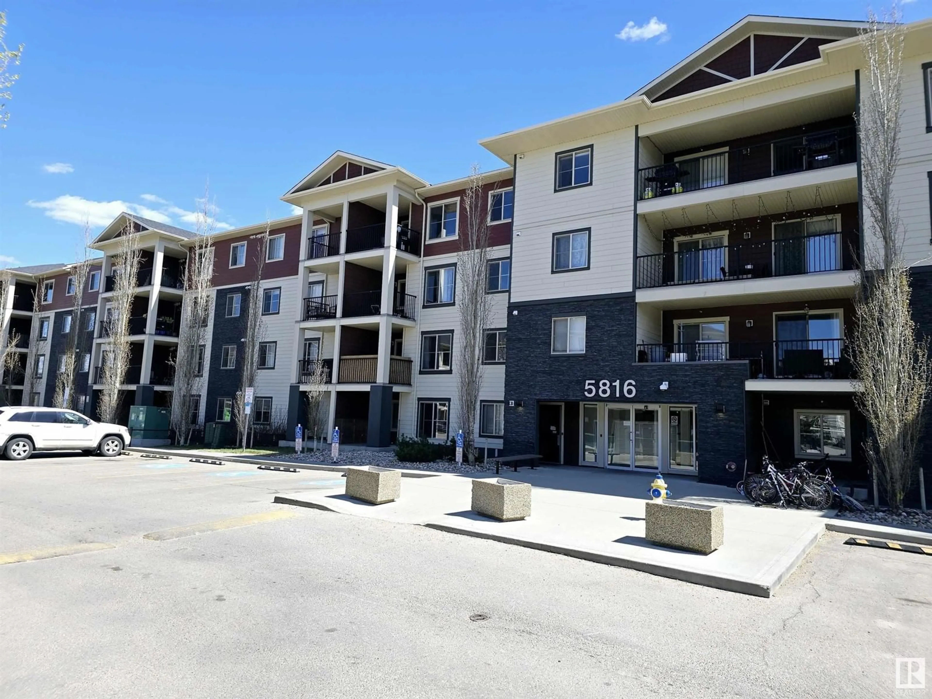 A pic from outside/outdoor area/front of a property/back of a property/a pic from drone, unknown for #303 - 5816 MULLEN PL, Edmonton Alberta T6R0W3