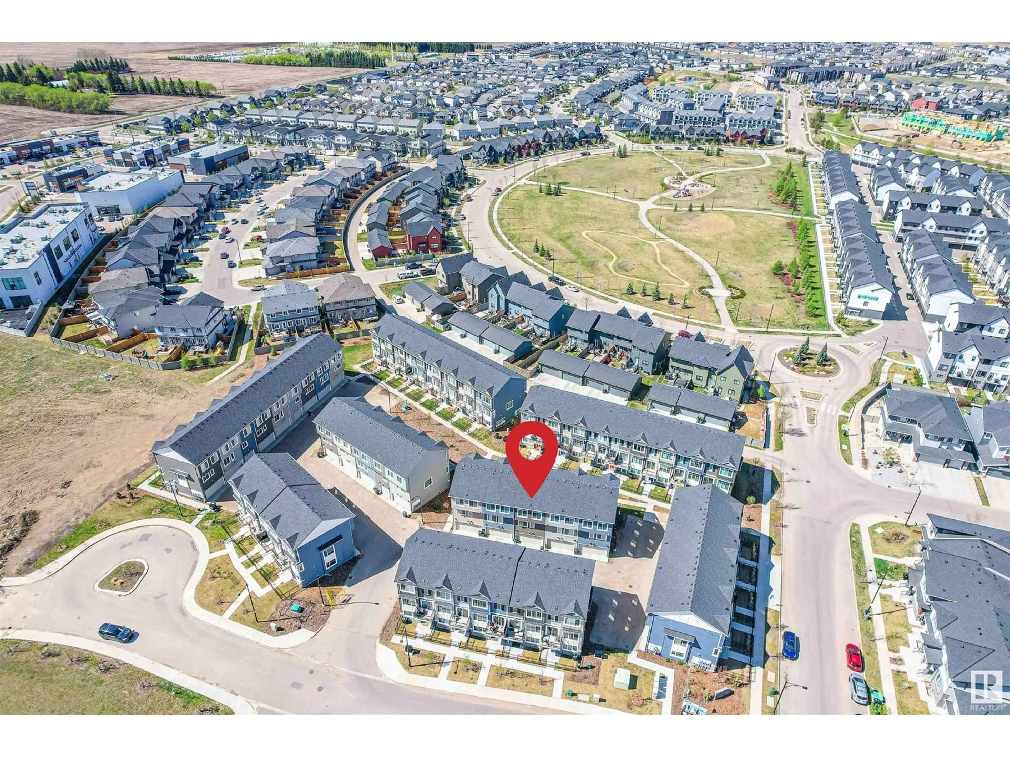 A pic from outside/outdoor area/front of a property/back of a property/a pic from drone, street for 8 - 6214 CARTMELL CO, Edmonton Alberta T6W3L5