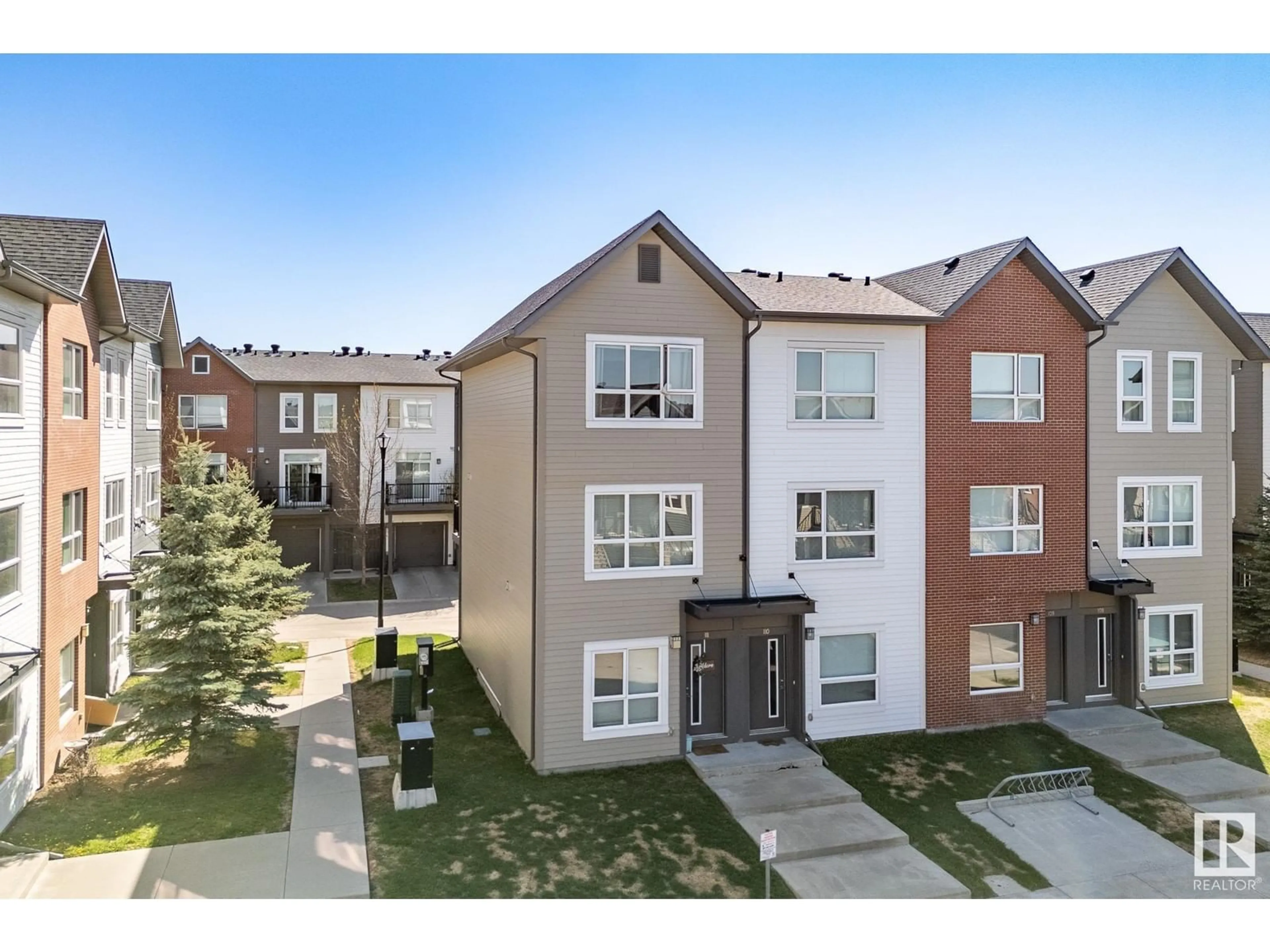 A pic from outside/outdoor area/front of a property/back of a property/a pic from drone, street for 111 - 2560 PEGASUS BV, Edmonton Alberta T5E6V4