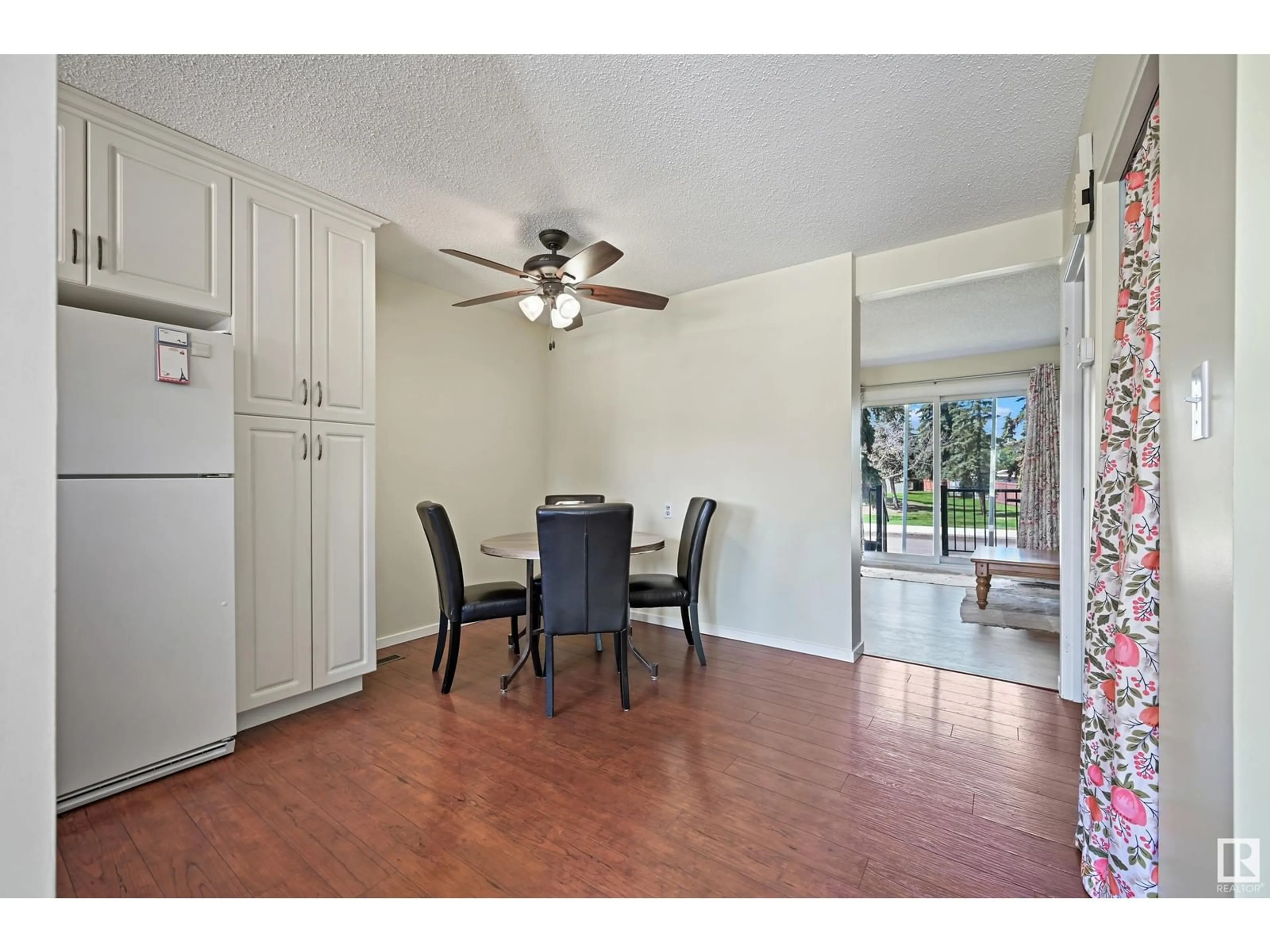 Dining room, wood/laminate floor for 9945 171 AV, Edmonton Alberta T5X4X2